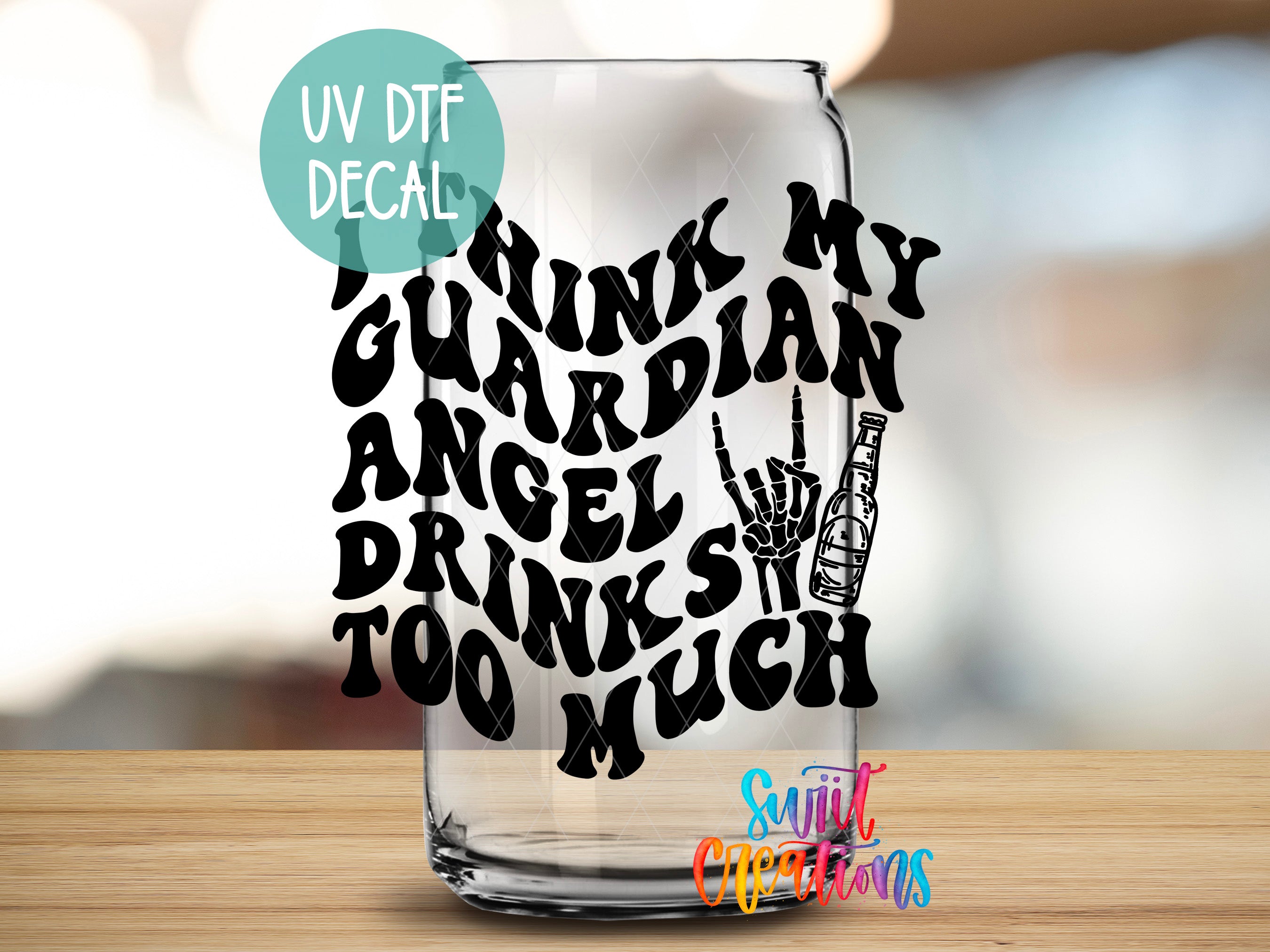 a glass with some writing on it sitting on a table