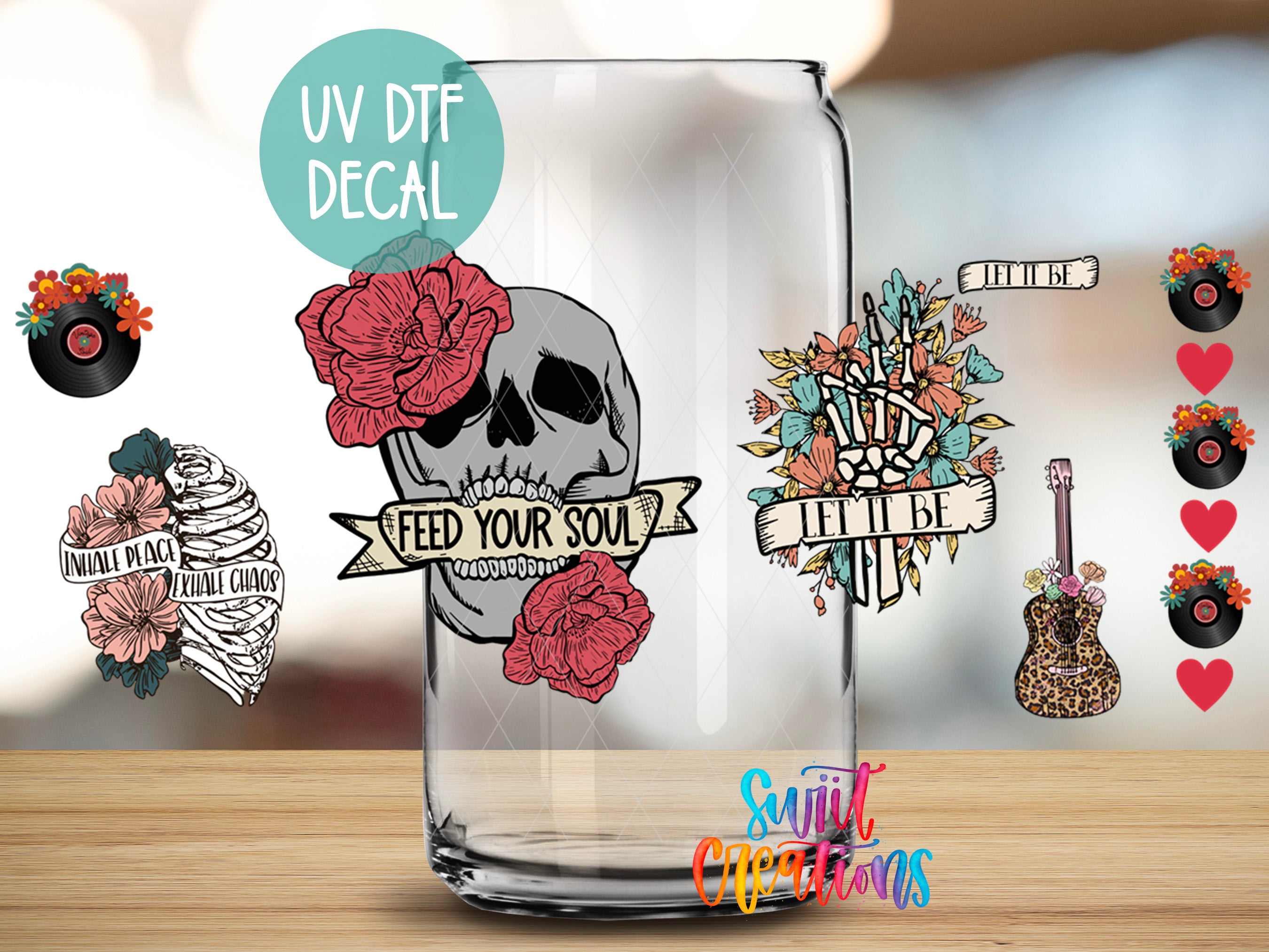 a glass with a skull and flowers on it