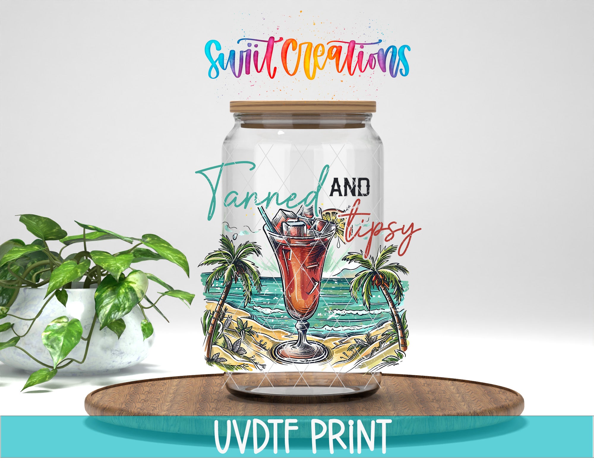 a glass jar with a tropical beach scene and a drink inside, along with the text "Swift Creations" and "Tanned and Tipsy" printed on it.