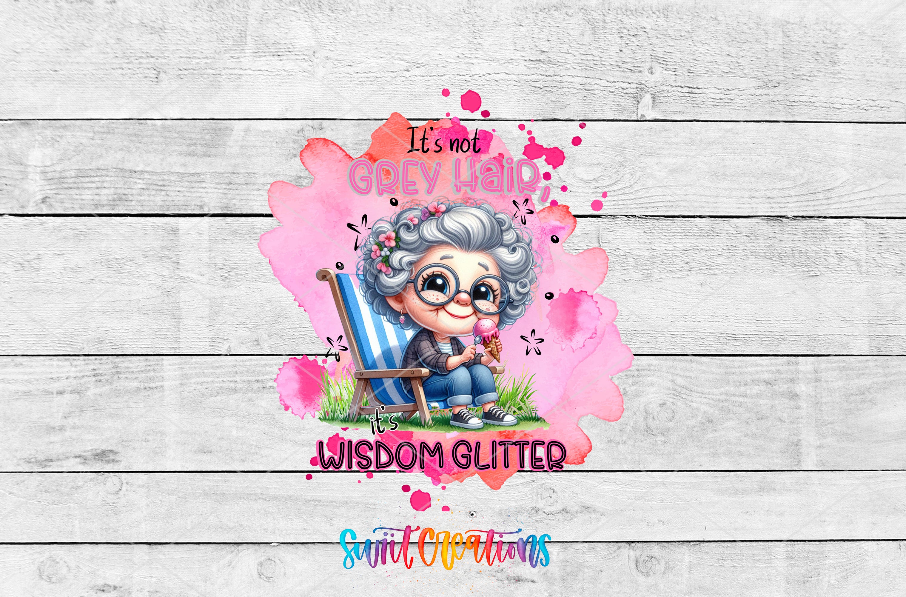 A cartoon image of an elderly woman sitting in a chair, surrounded by pink splashes and flowers, with the text "It's not grey hair, it's wisdom glitter" and "Spirit Creations" below the image.