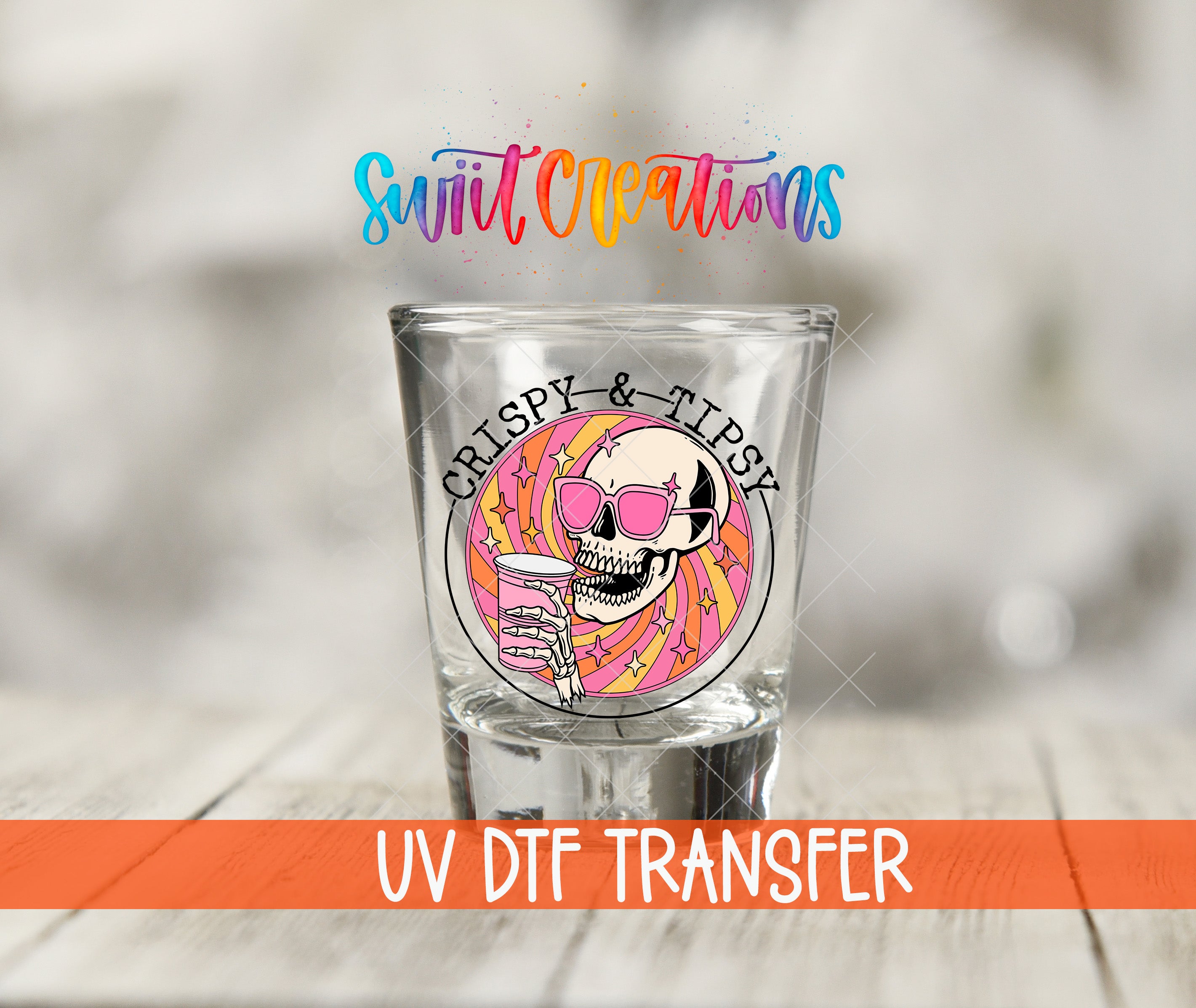 A shot glass with a skull wearing sunglasses and holding a drink, along with the text "UV Dtf Transfer" and "Swift Creations" written above it.
