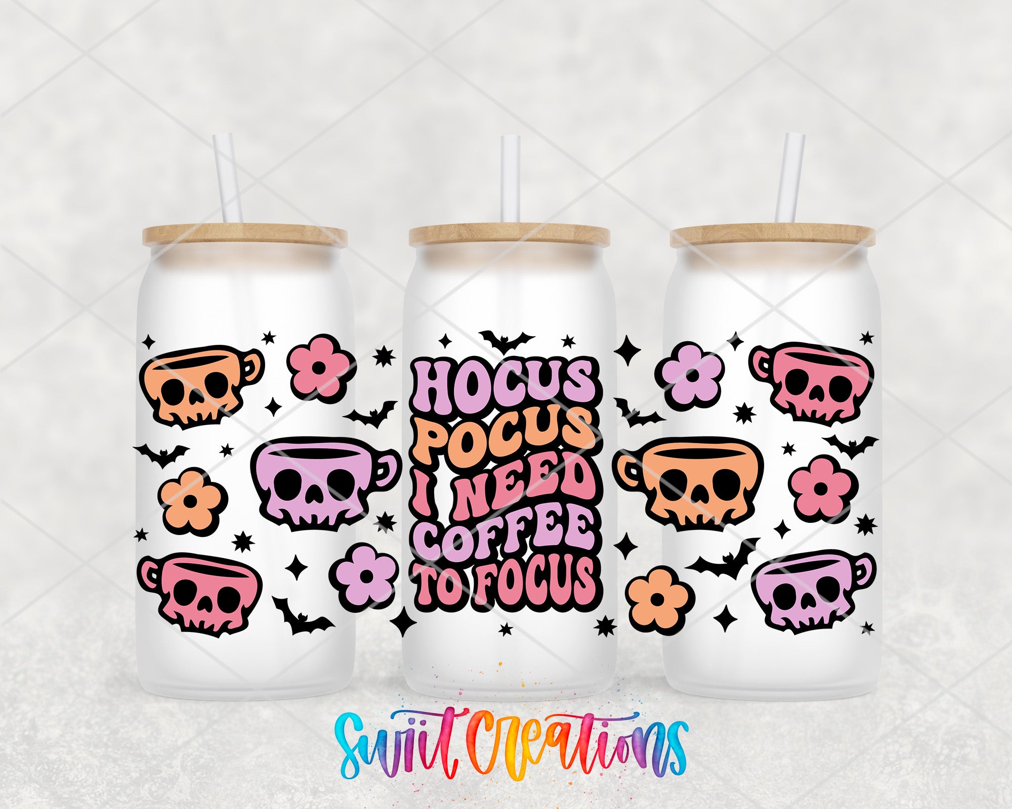 three white tumblers with colorful designs and text on them.