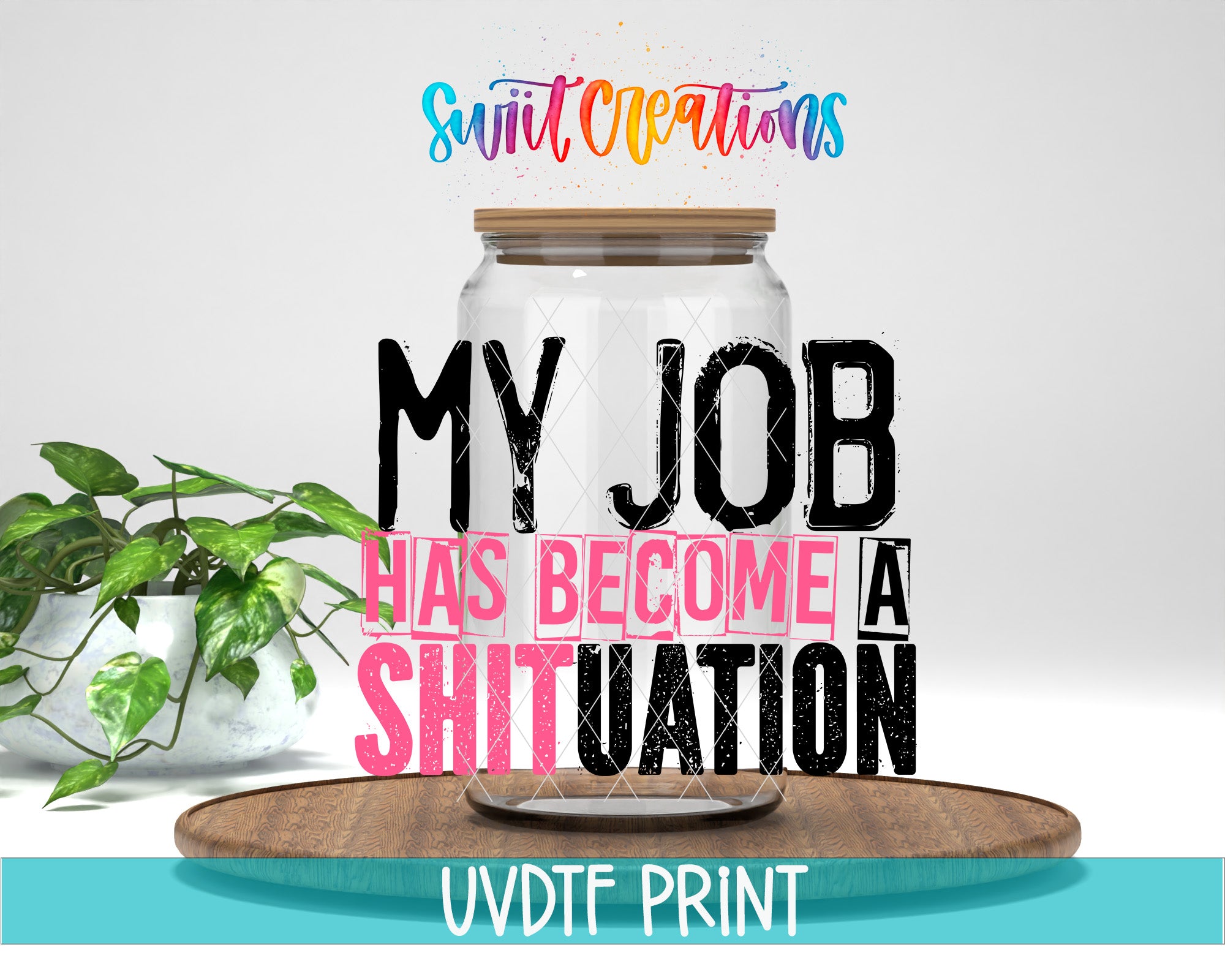 a large text overlay that reads "MY JOB HAS BECOME A SHIT UATION" in bold, colorful letters. The text is positioned over a wooden tray, and there is a potted plant in the background.