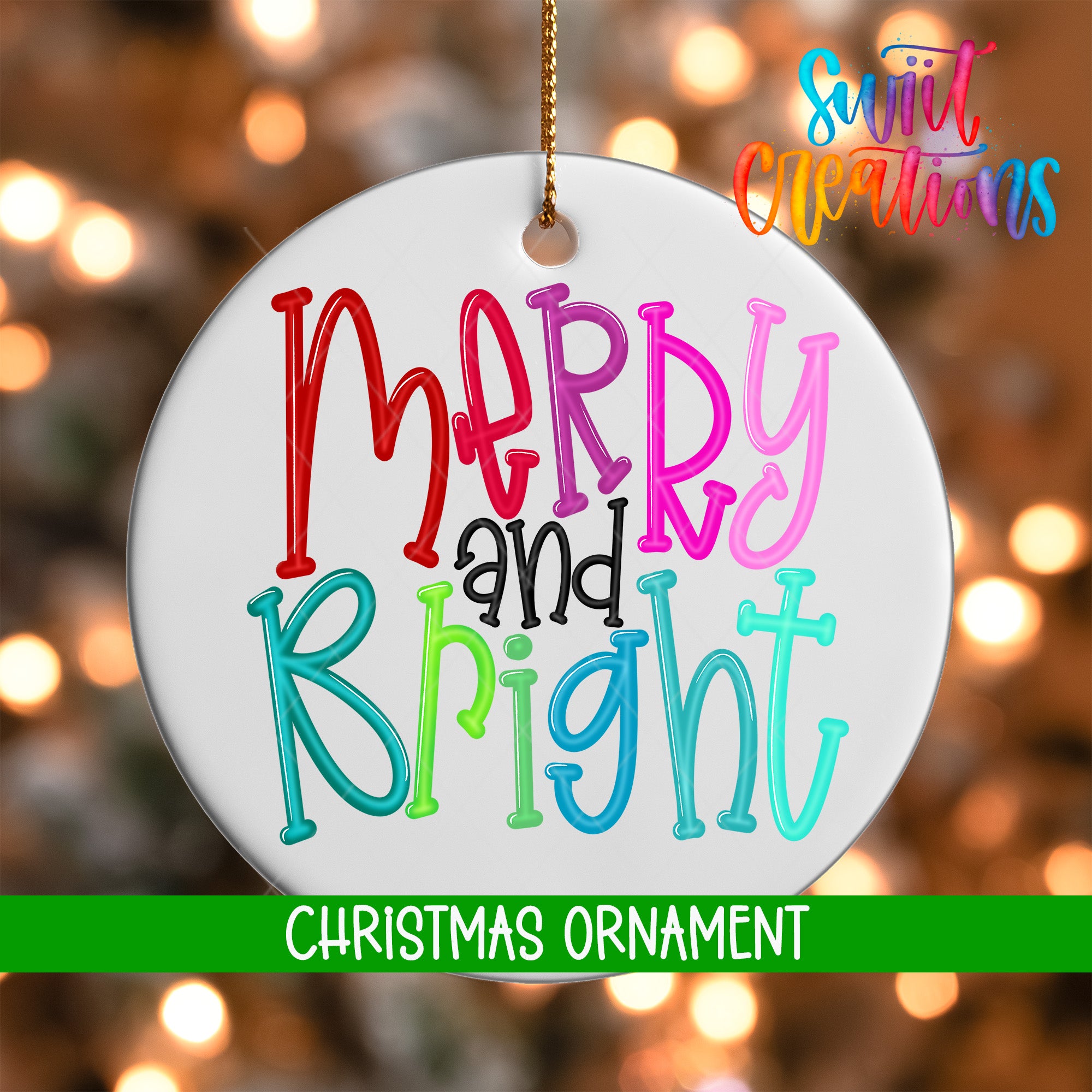 A white Christmas ornament with colorful text that says "Merry and Bright" hanging from a string.