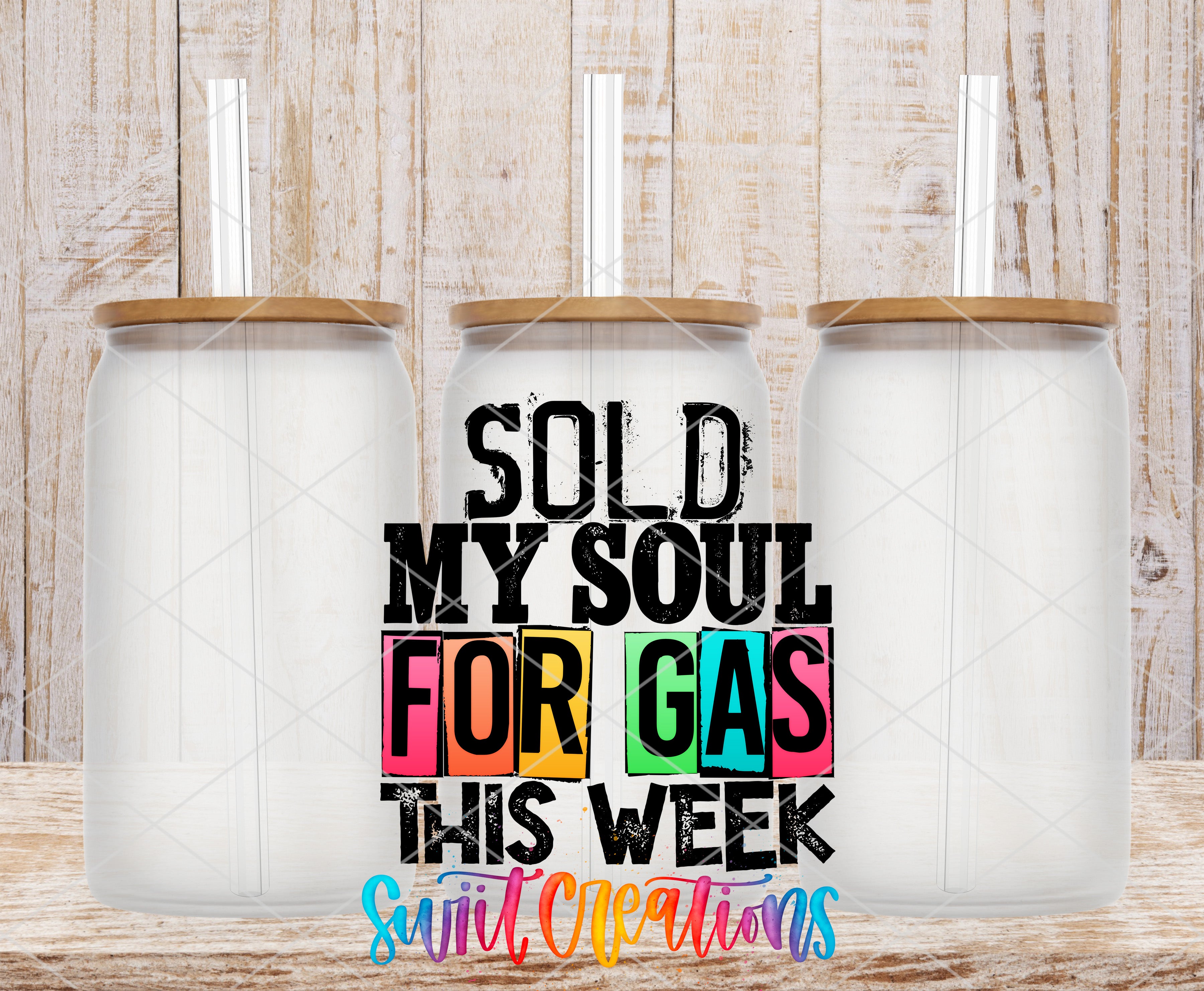 three glass jars with lids, arranged in a row against a wooden background. The text overlay on the image reads "SOLD MY SOUL FOR GAS THIS WEEK" and "suction creations".