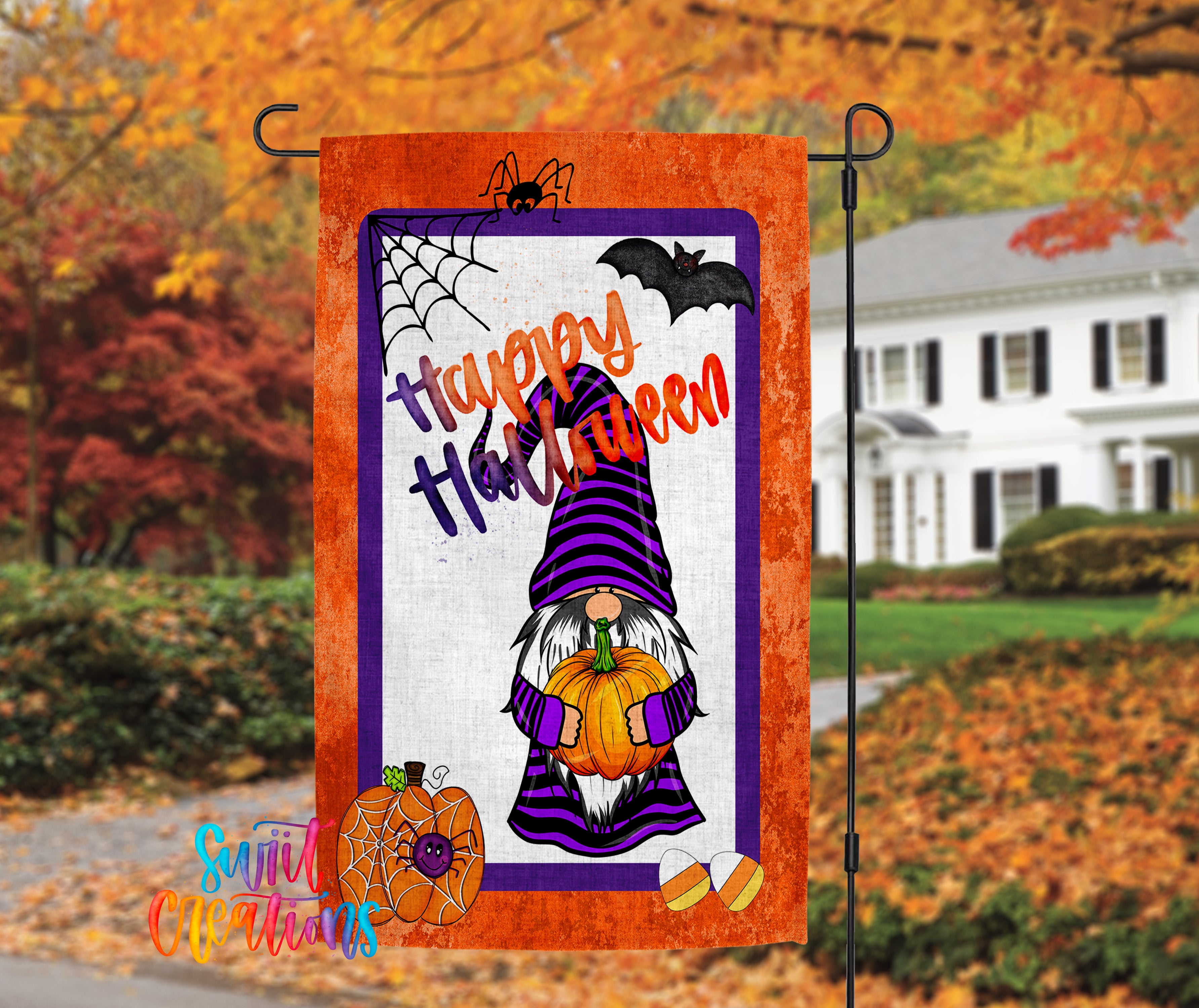 A Halloween-themed garden flag featuring a gnome holding a pumpkin and a spider web, with the text "Happy Halloween" displayed.