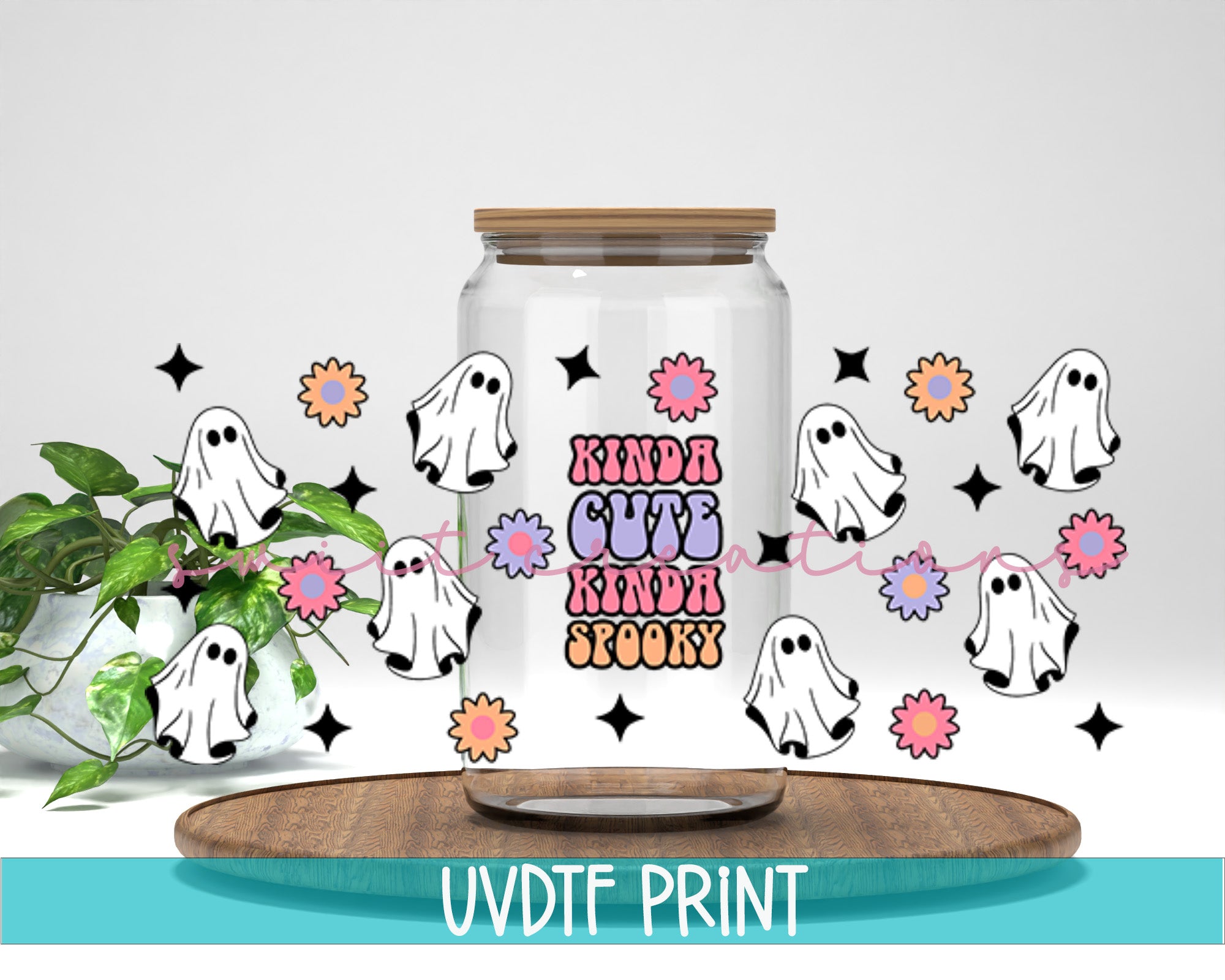 a glass jar with a sticker of a ghost on it