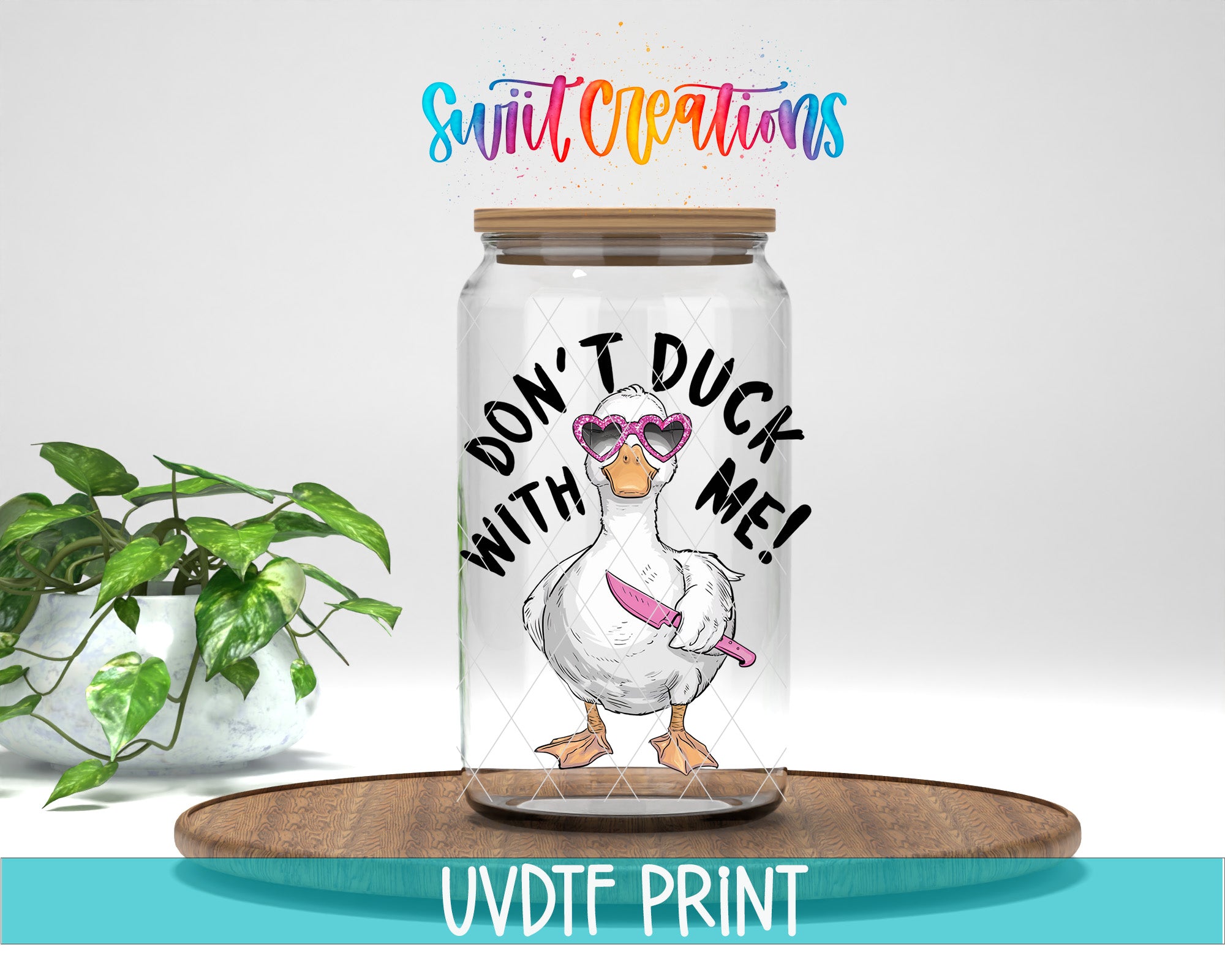 A glass jar with a cartoon duck wearing sunglasses and holding a knife, accompanied by the text "DON'T DUCK WITH ME!"