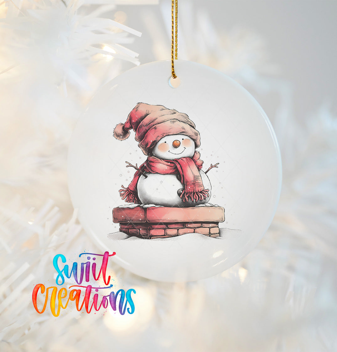 A snowman ornament with a red scarf and hat, sitting on a brick chimney, is hanging on a Christmas tree.