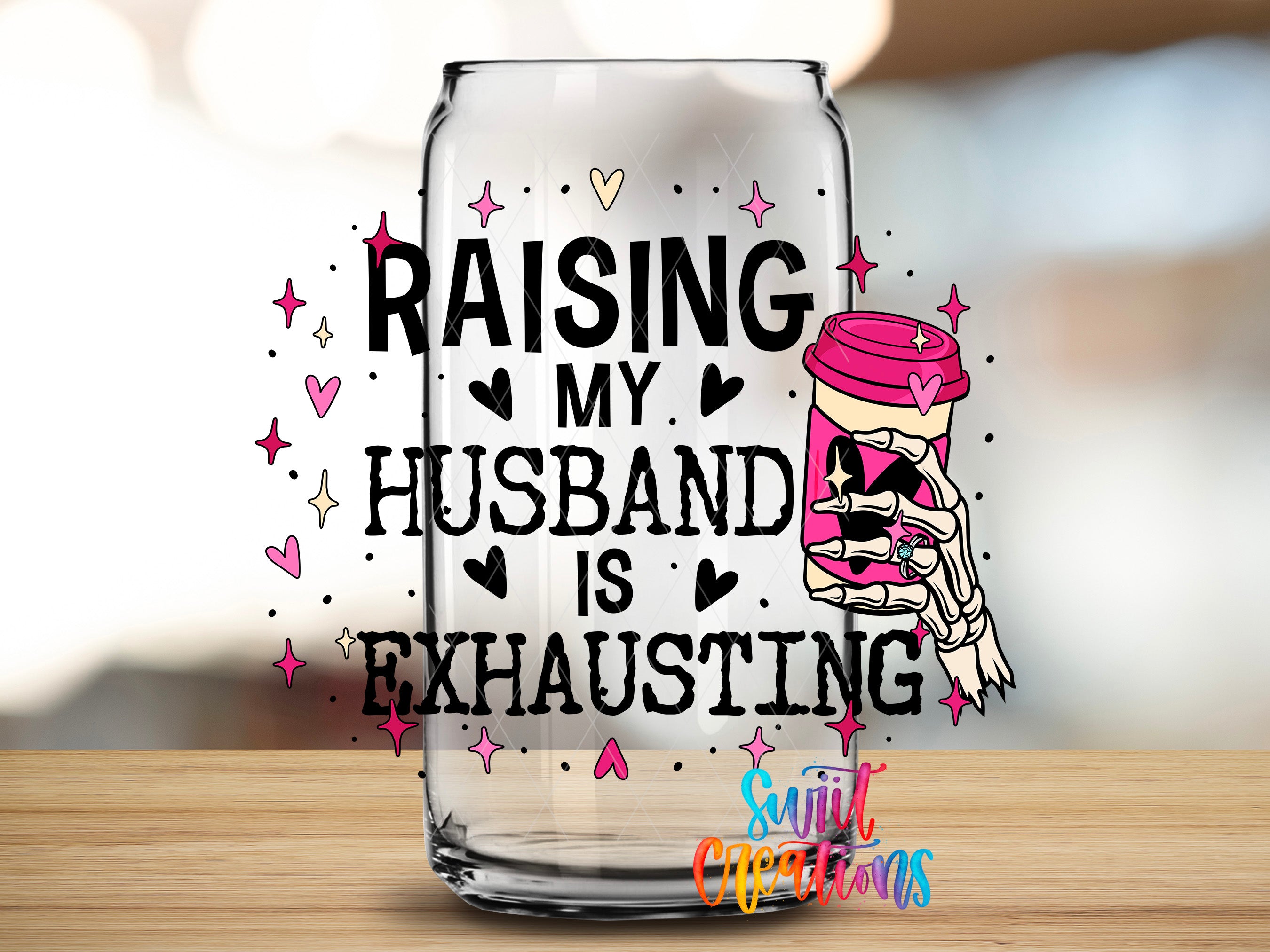 a glass mug with a humorous text and graphic design on it.