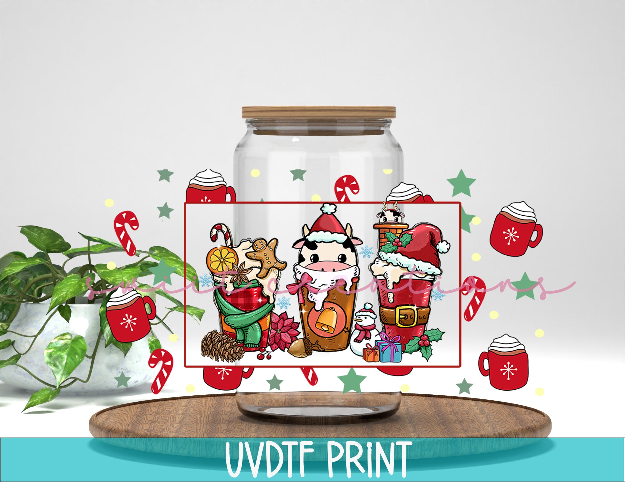 a glass jar with a christmas scene on it