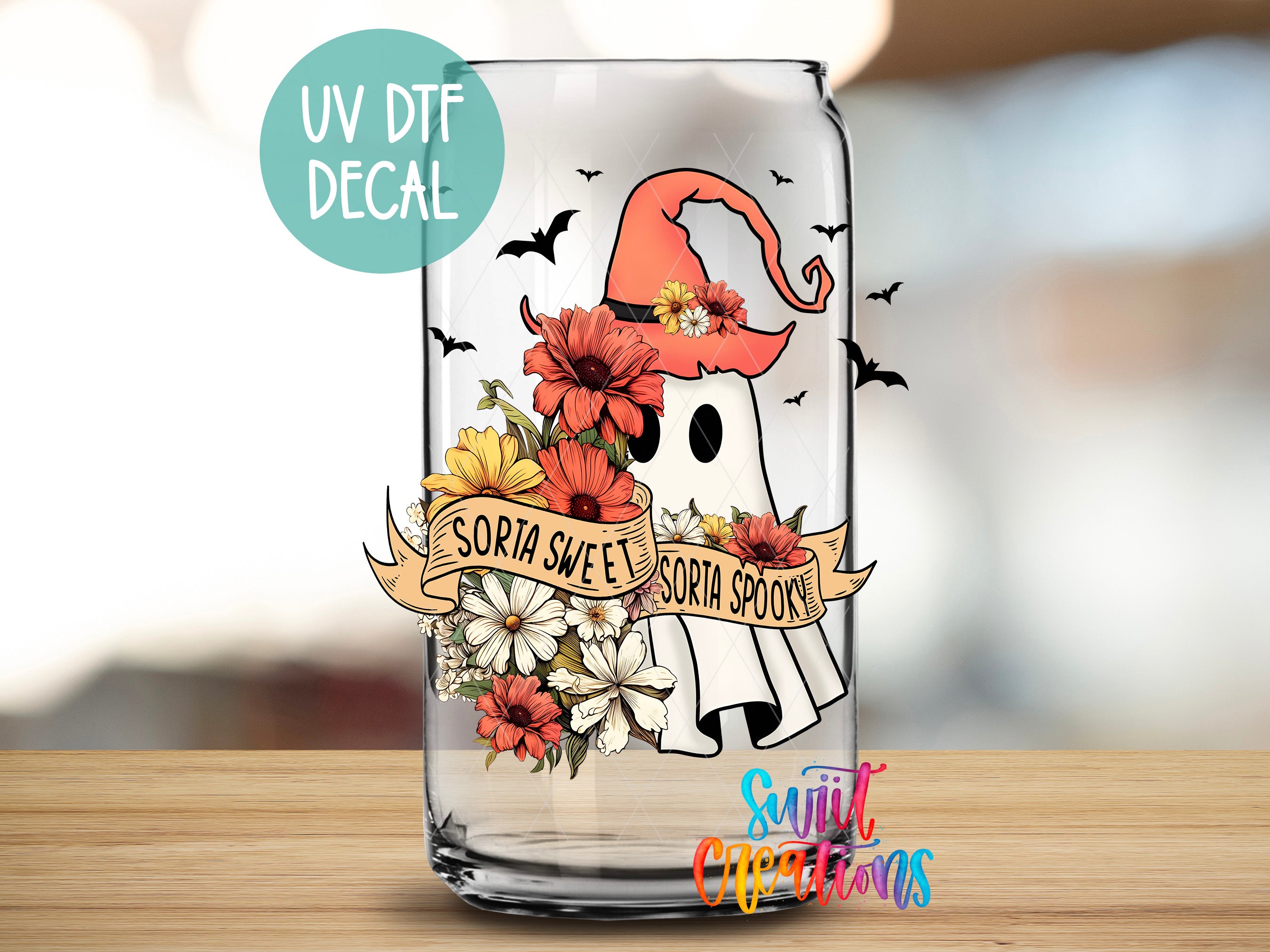 a glass with a picture of an elephant on it