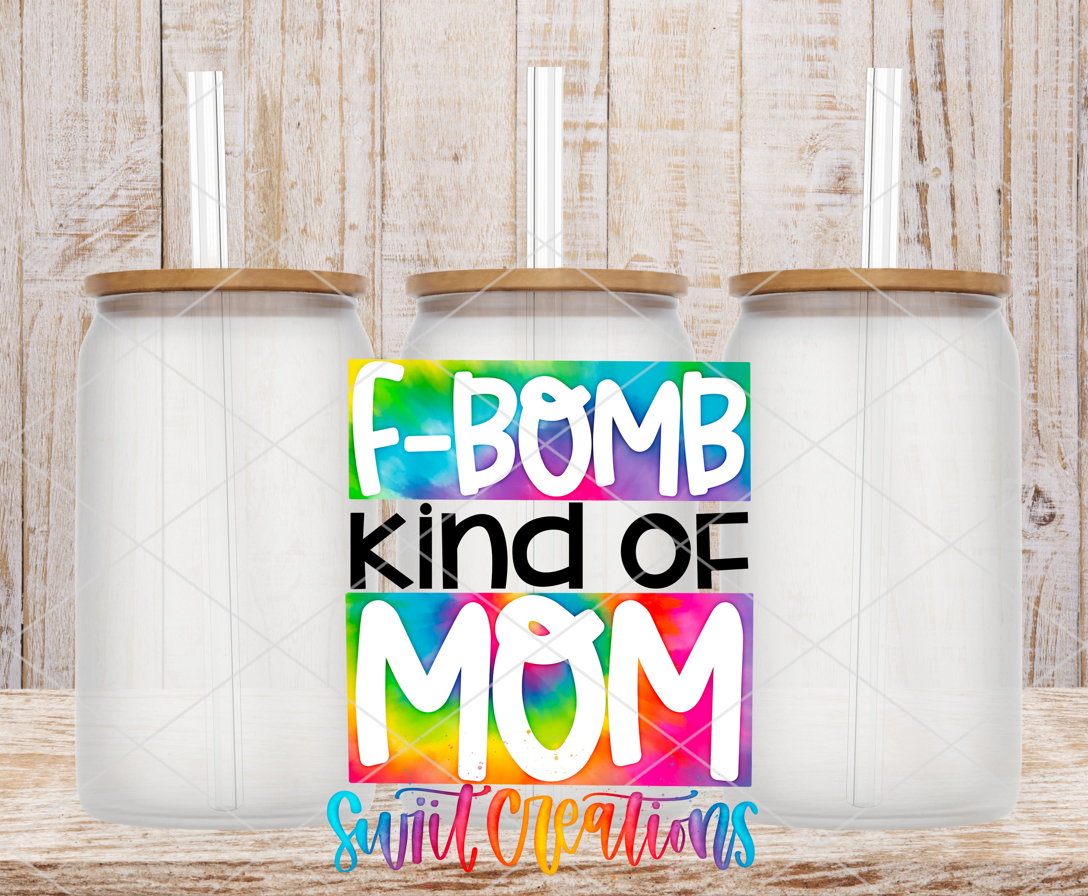Three clear glass cans with the F Bomb Kind of Mom UV DTF transfer by Swiit Creations