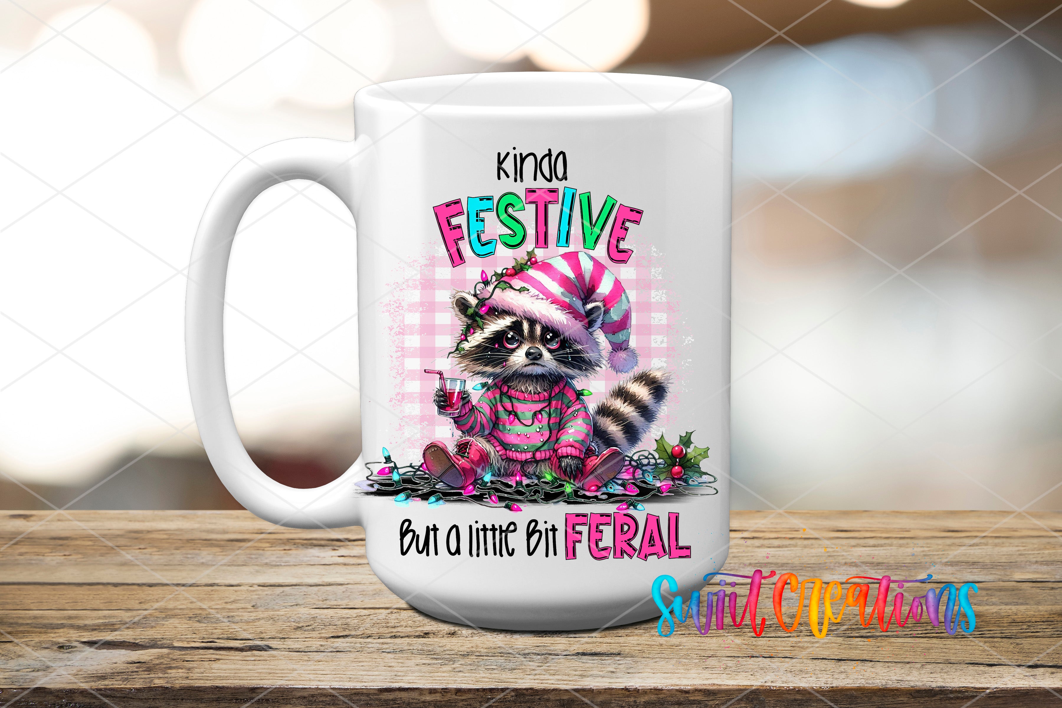 Swiit Creations UV DTF Kinda Festive But a Little Bit Feral transfer applied to a white ceramic mug