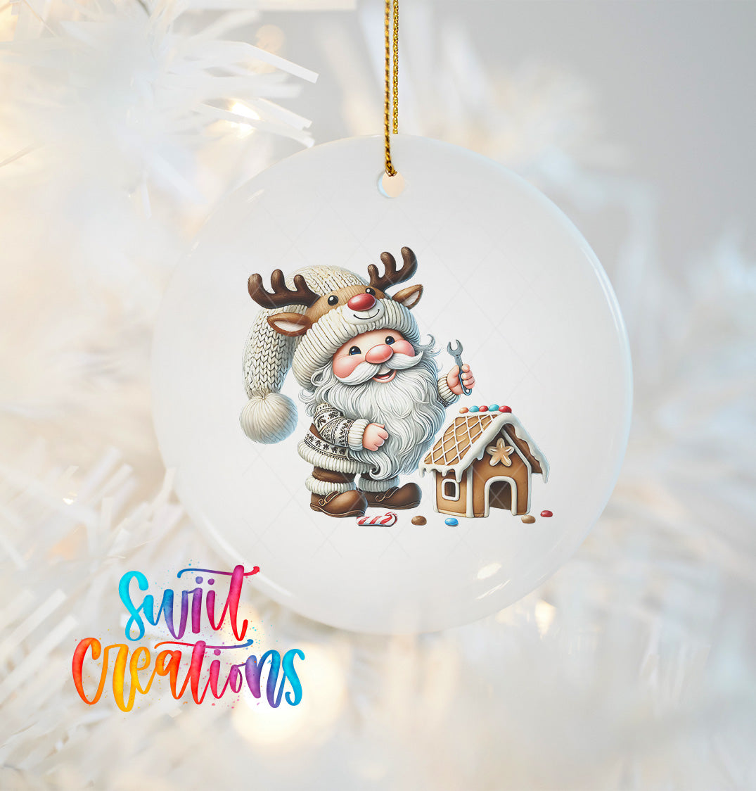 A white ornament featuring a Santa Claus figure with antlers and a gingerbread house, along with the text "Swift Creations" in the bottom left corner.