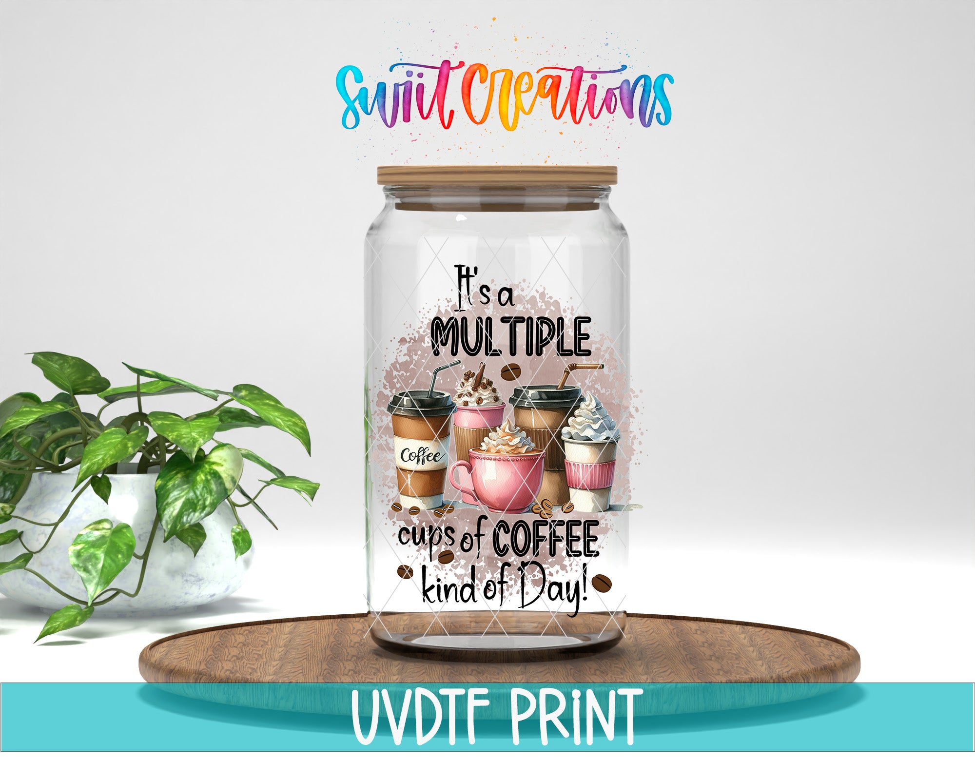 A glass jar with a lid, filled with coffee cups, sits on a wooden surface. The jar has a label that reads "It's a MULTIPLE cups of COFFEE kind of Day!" The background is a plain white wall. There is also a potted plant to the left of the jar.