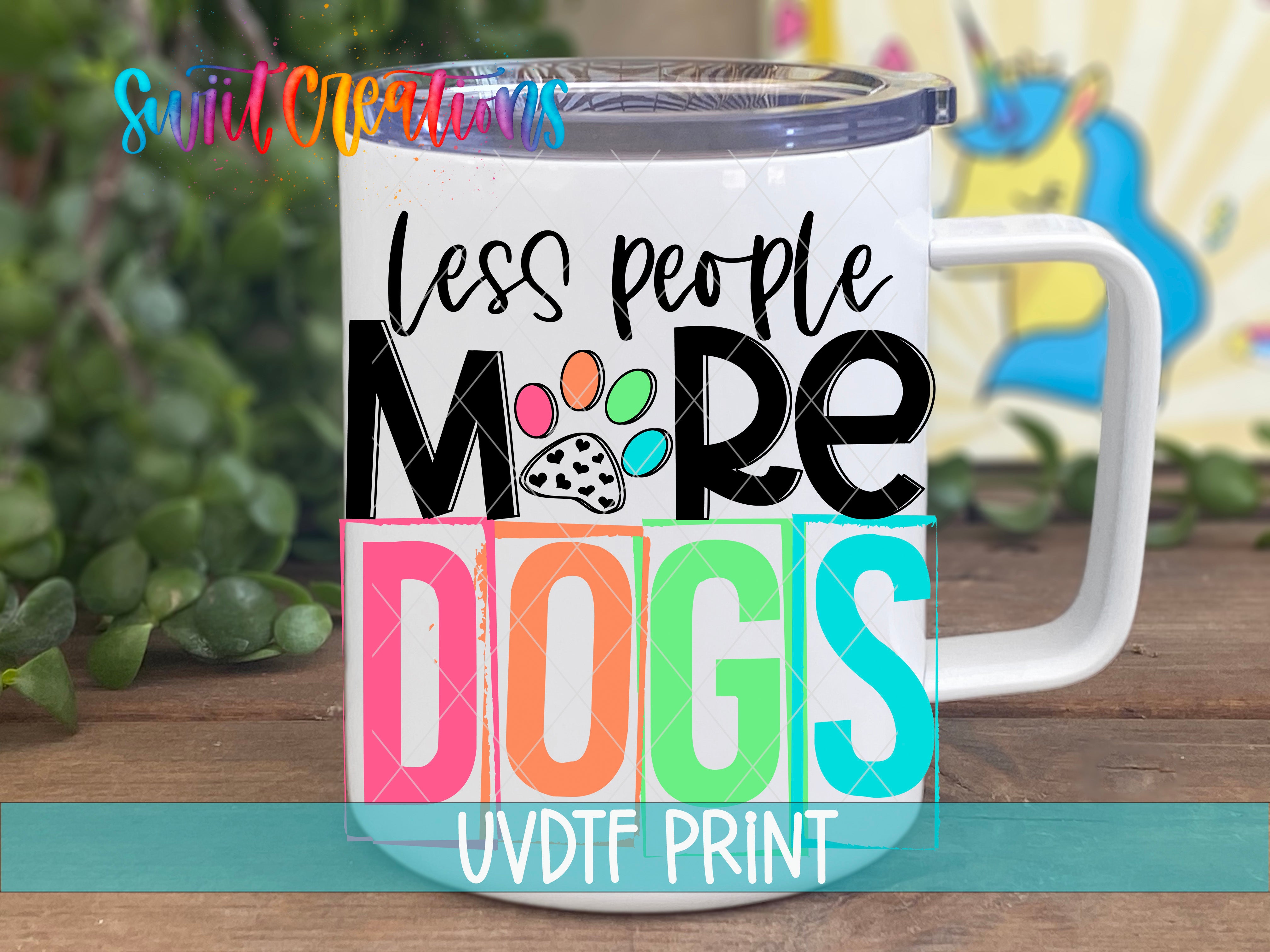 a coffee mug with the words less people more dogs on it