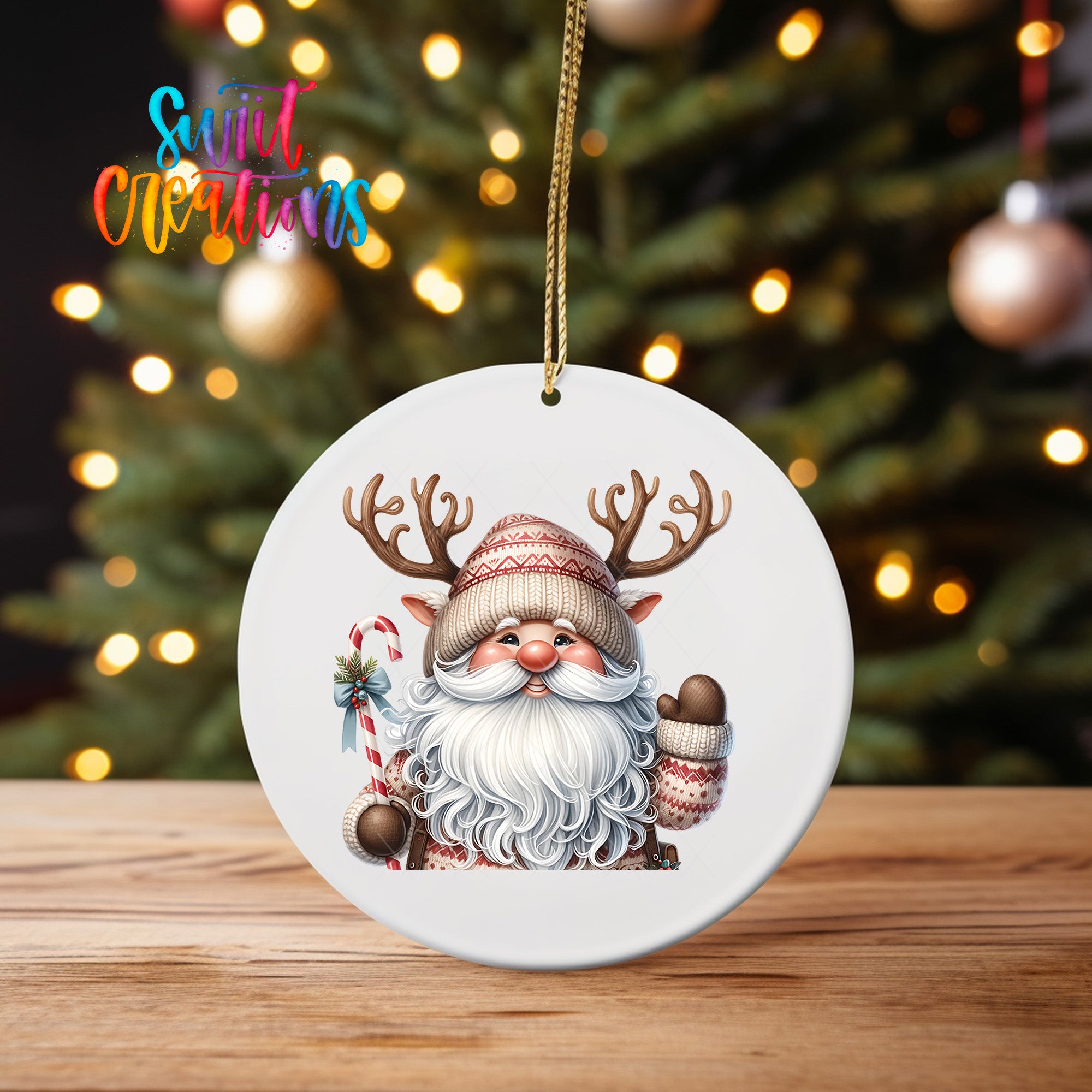 A white ornament featuring a smiling Santa Claus with antlers and a beard, set against a blurred background of Christmas lights.