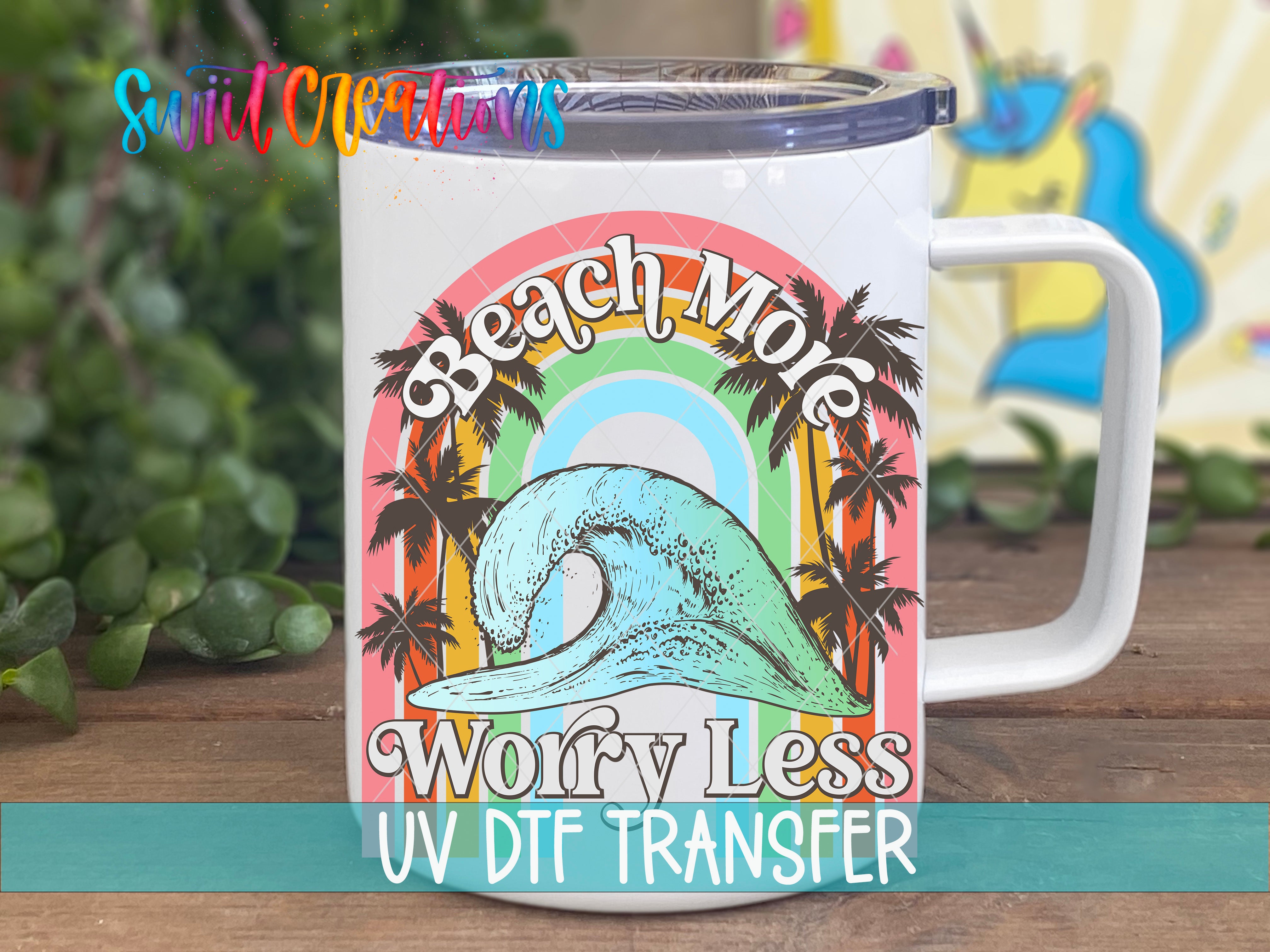 Swiit Creations UV DTF Beach More Worry Less transfer displayed on a white coffee mug