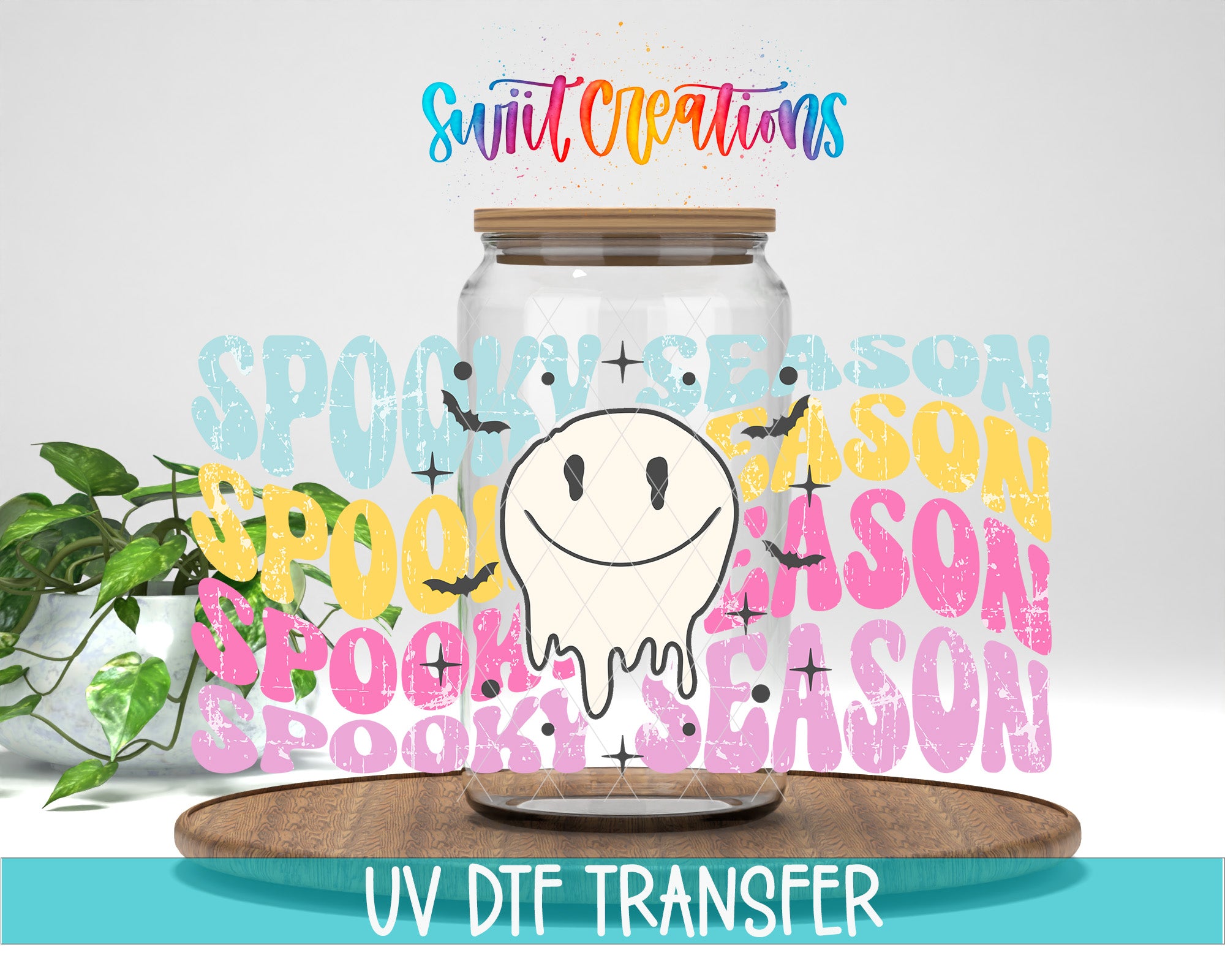 a glass jar with a smiling ghost inside, surrounded by colorful text that says "SPOOKY SEASON" in various fonts and colors.