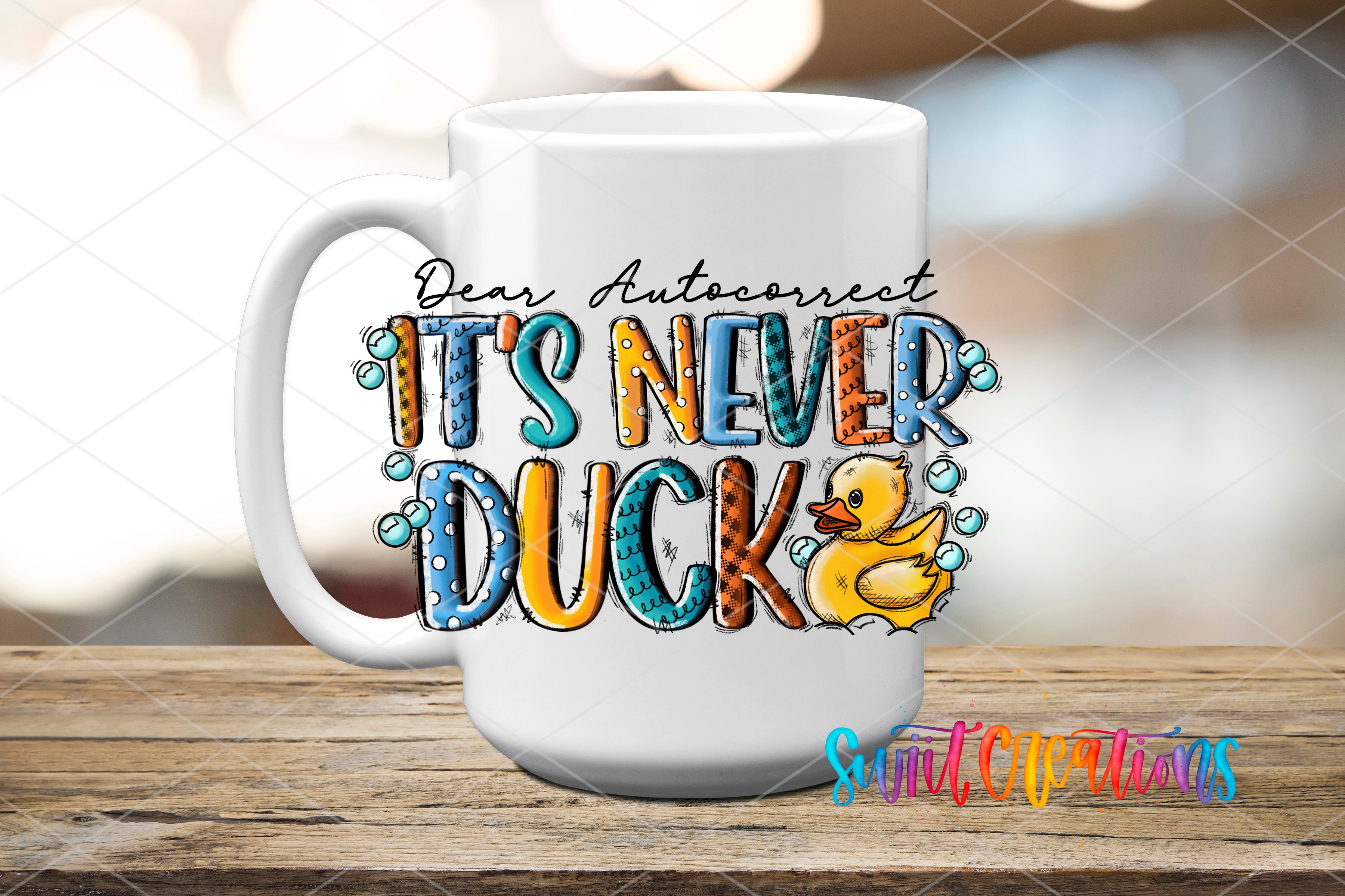 A white mug with a colorful design featuring the text "Dear Autocorrect, it's never ducks" along with a yellow duck illustration.