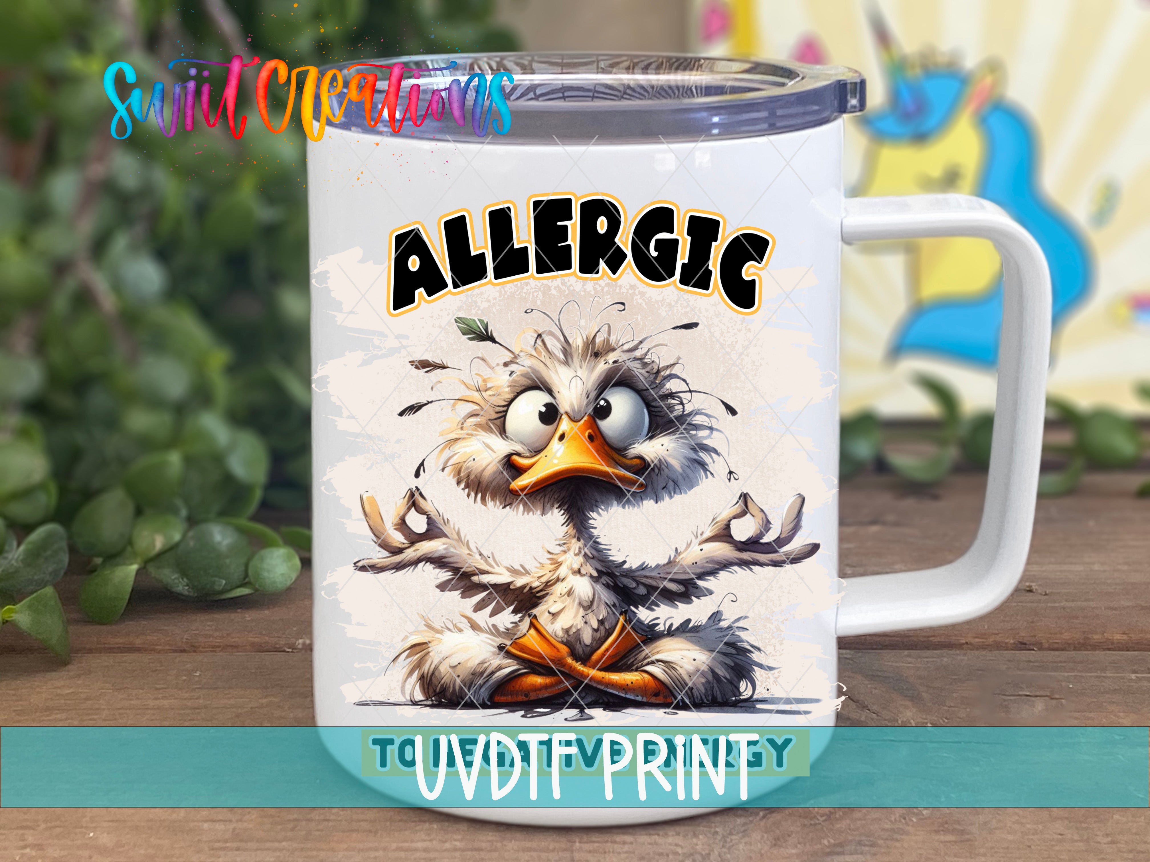 a white coffee mug with an image of an angry bird on it