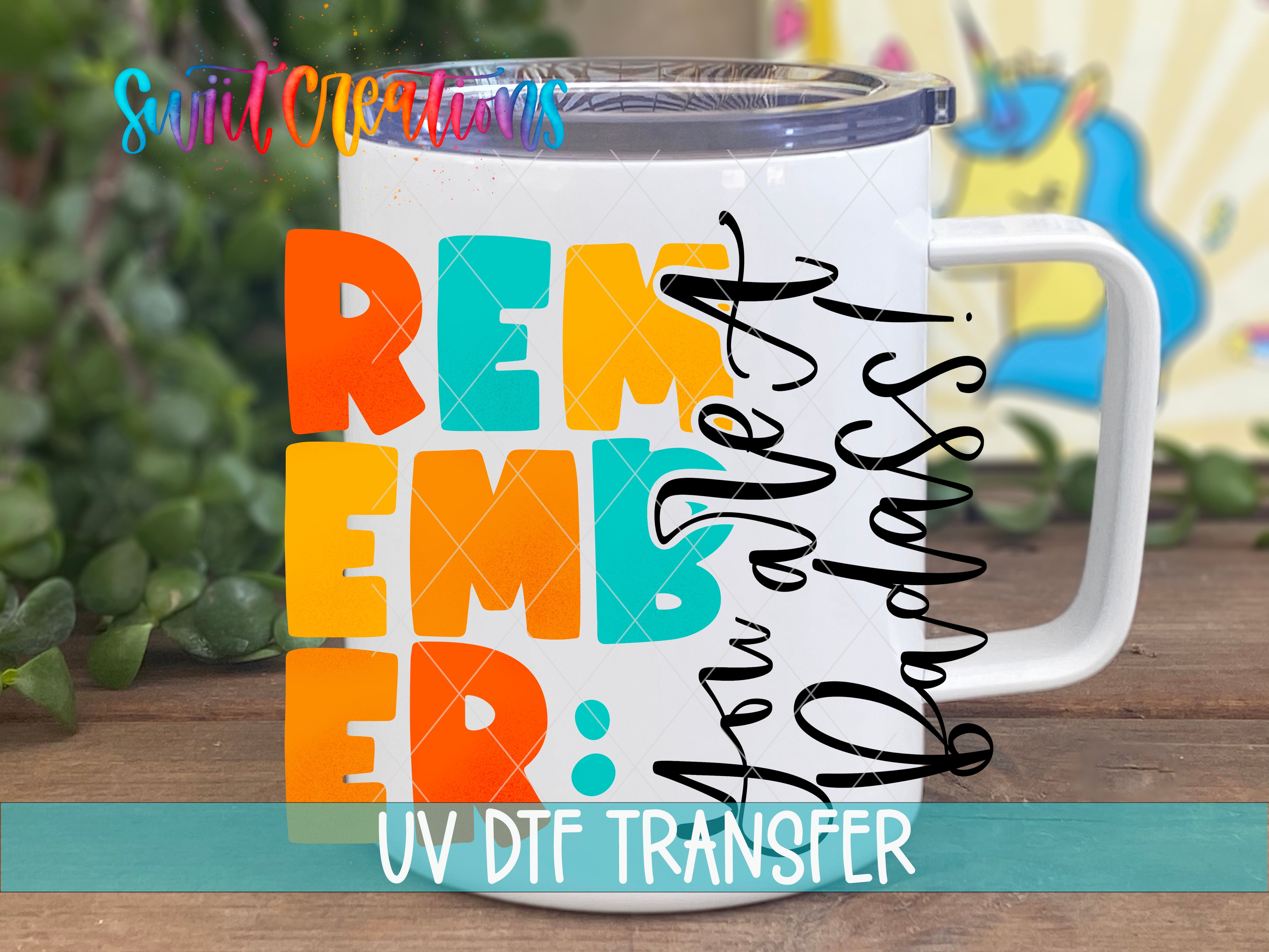 Swiit Creations Remember You Are a Badass UV DTF transfer displayed on a white coffee mug