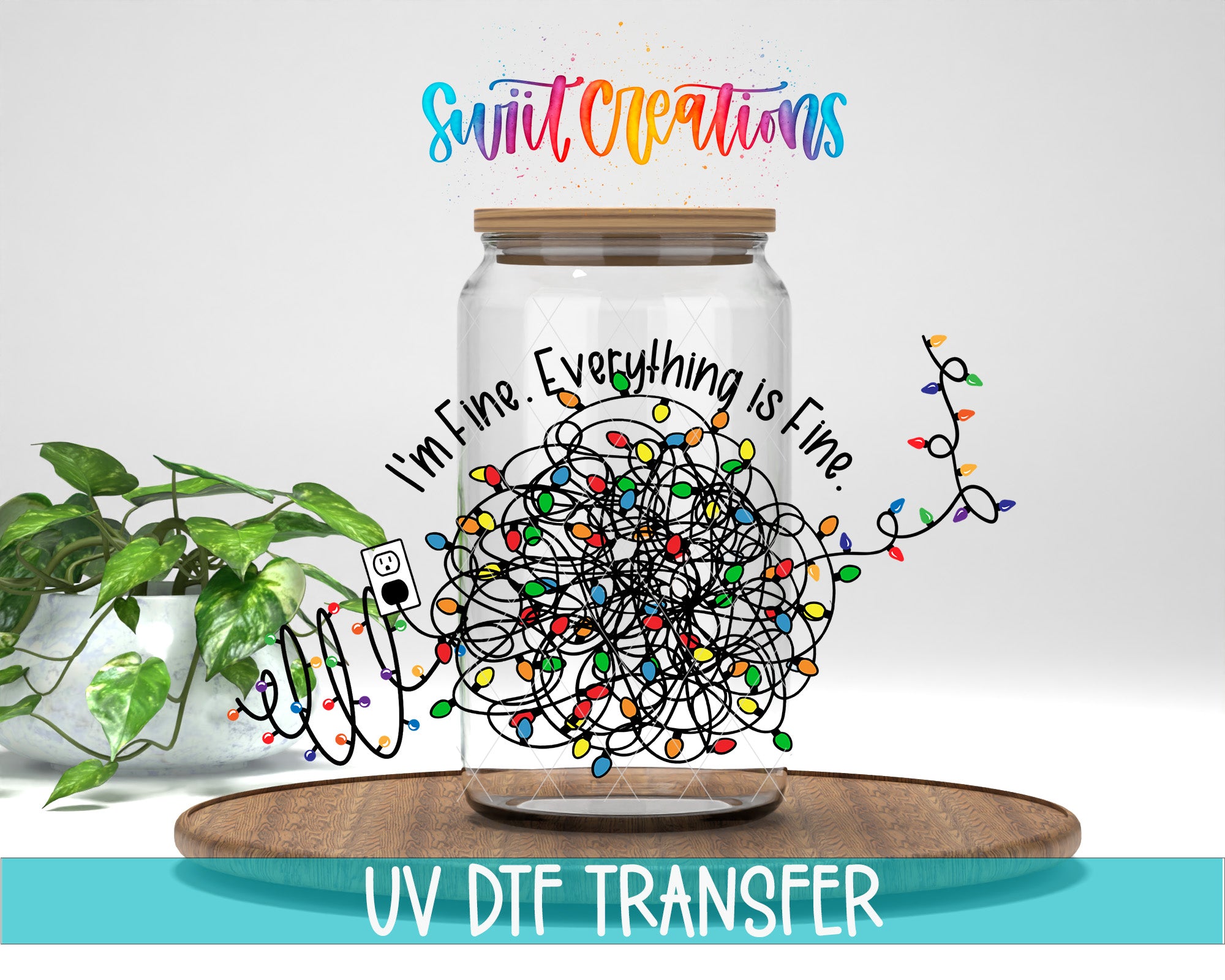 a glass jar with a colorful, tangled arrangement of lights inside, accompanied by a plant and a wooden tray. The text above the jar reads "Swift Creations" and "I'm Fine. Everything is Fine." The image also includes the text "UV DFT TRANSFER" at the bottom.