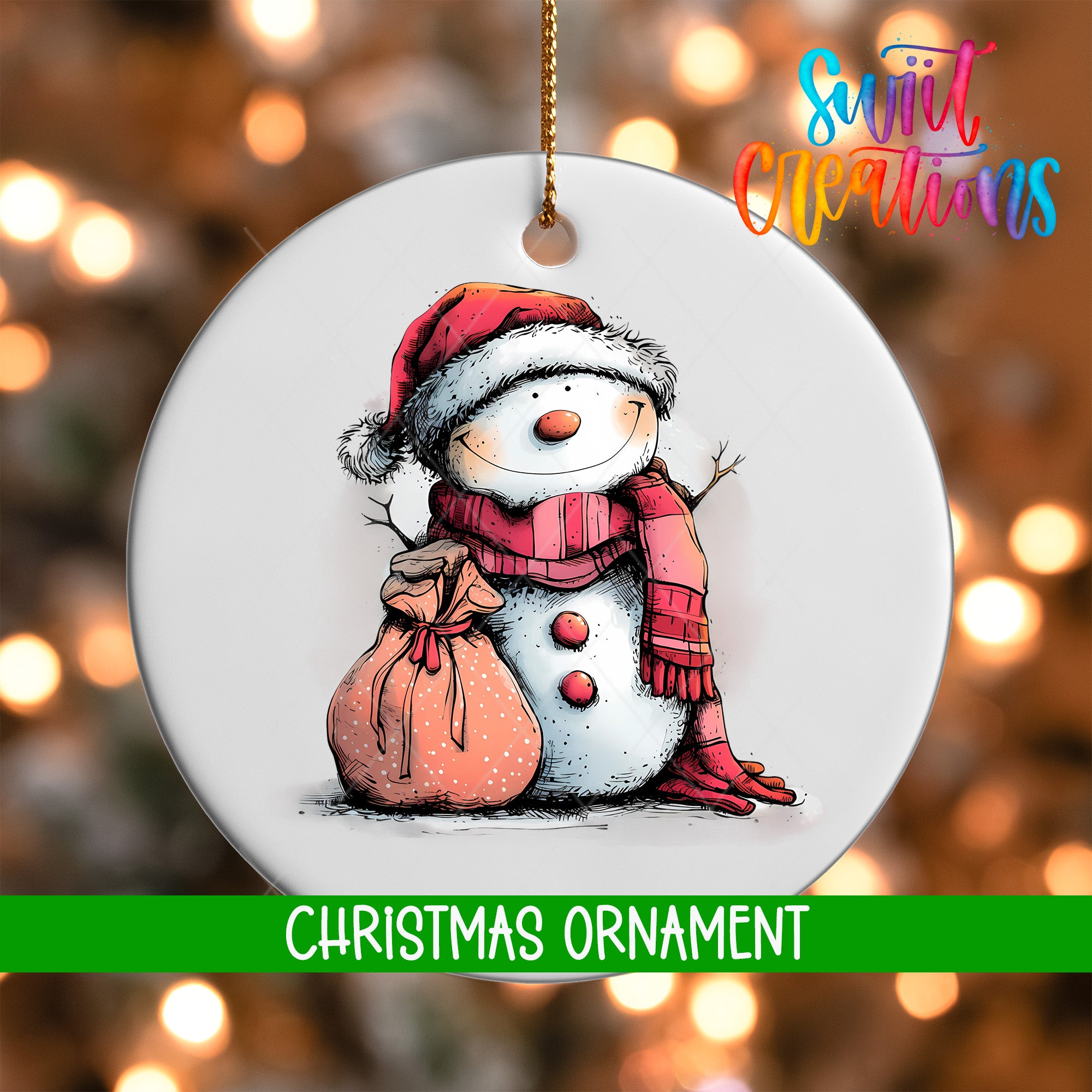 A white Christmas ornament featuring a smiling snowman wearing a red hat and scarf, holding a bag.