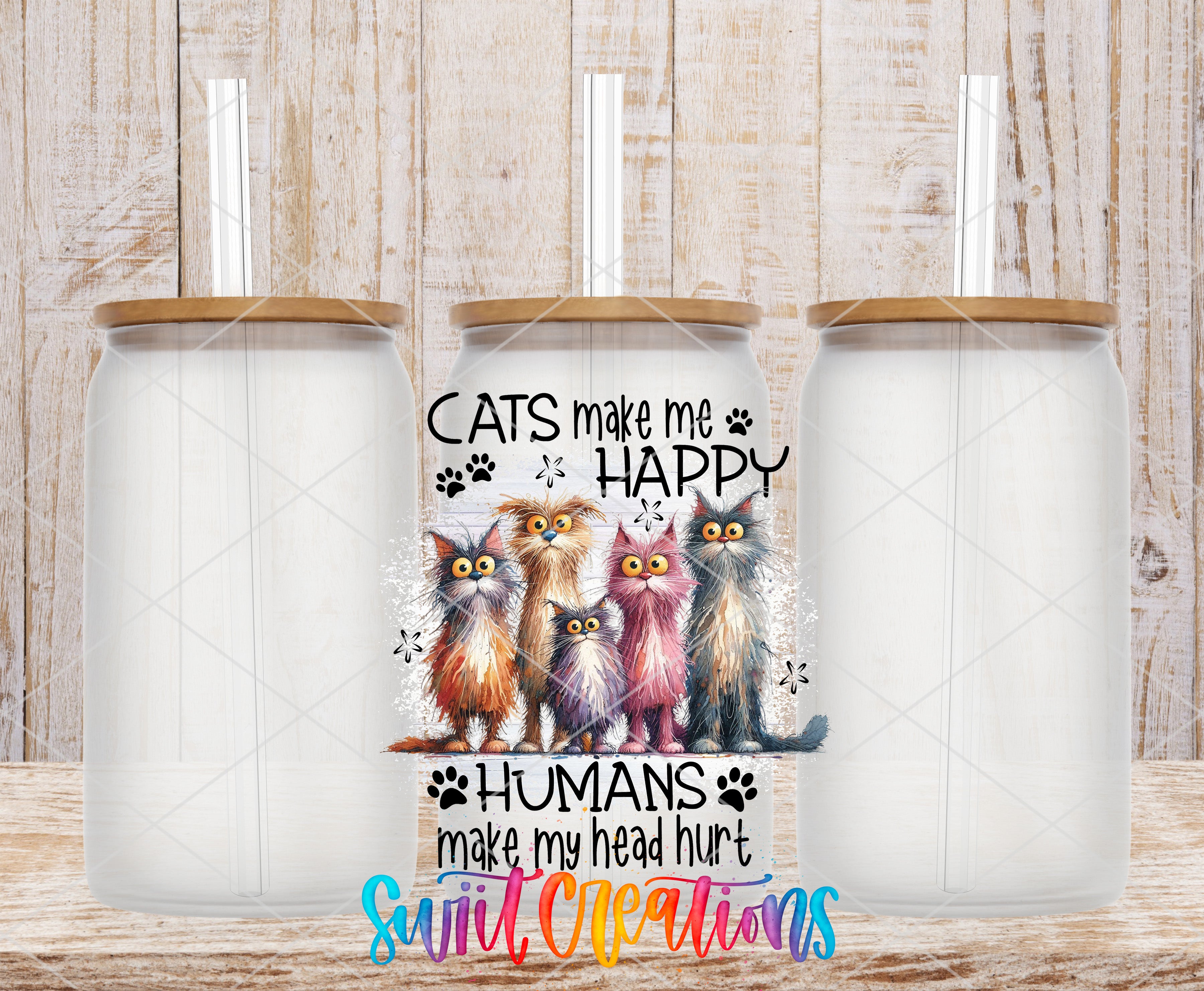 Swiit Creations UV DTF Cats Make Me Happy Humans Hurt My Heart transfer shown on a clear glass can set