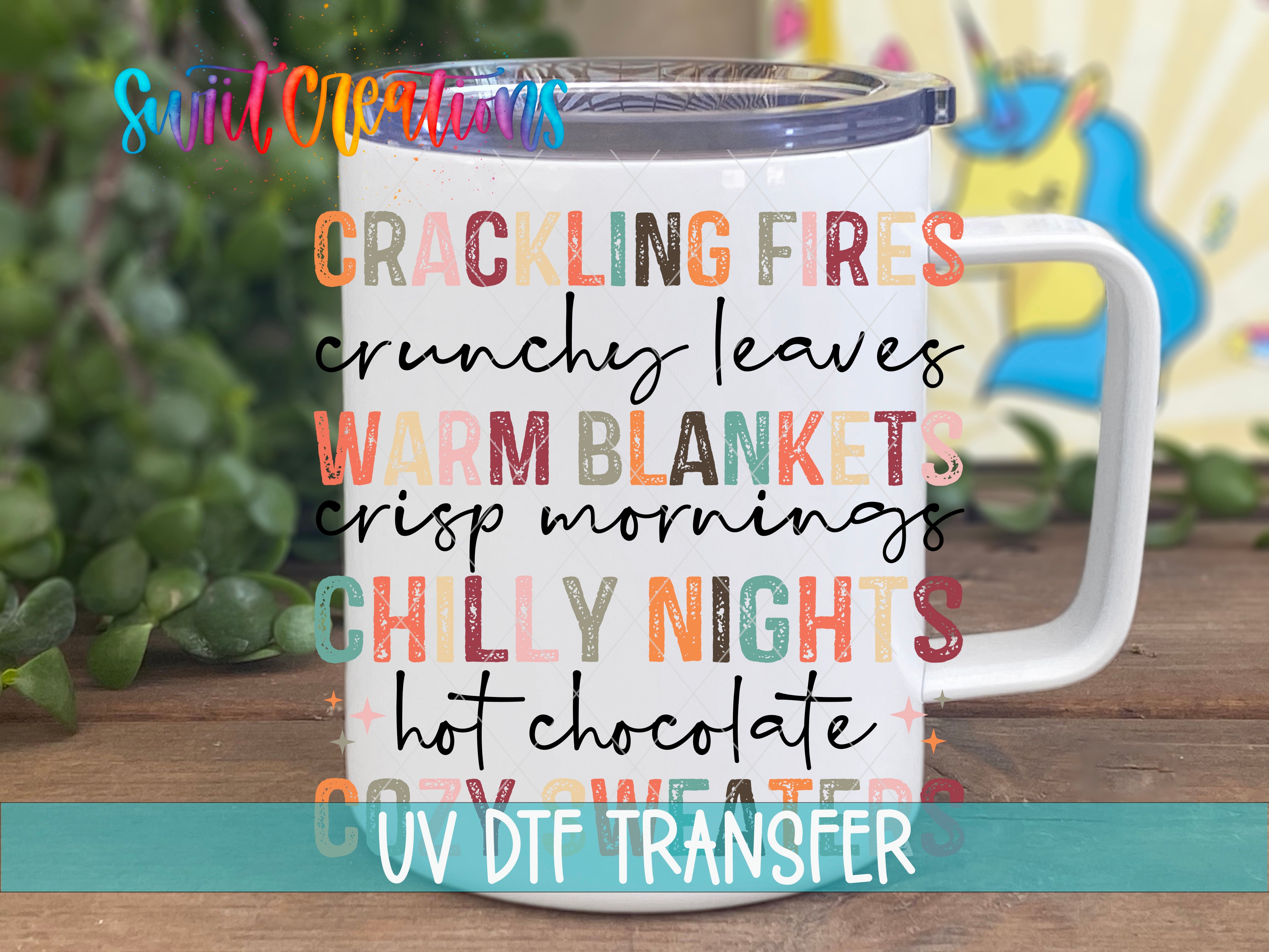 Swiit Creations UV DTF Warm and Cozy Fall transfer displayed on a white coffee mug