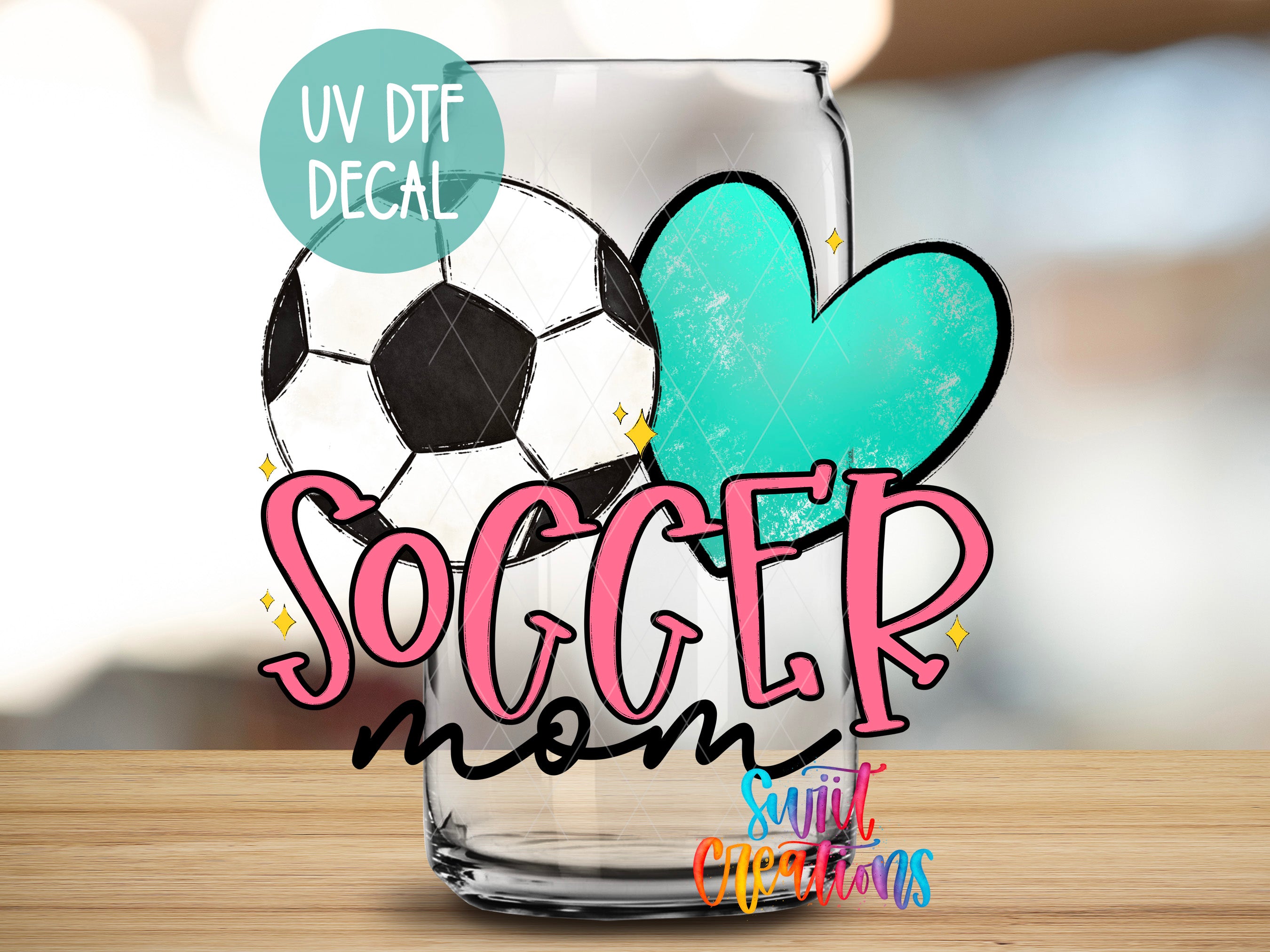 a soccer ball and a heart, with the text "SOCGER mom" written in pink cursive font.
