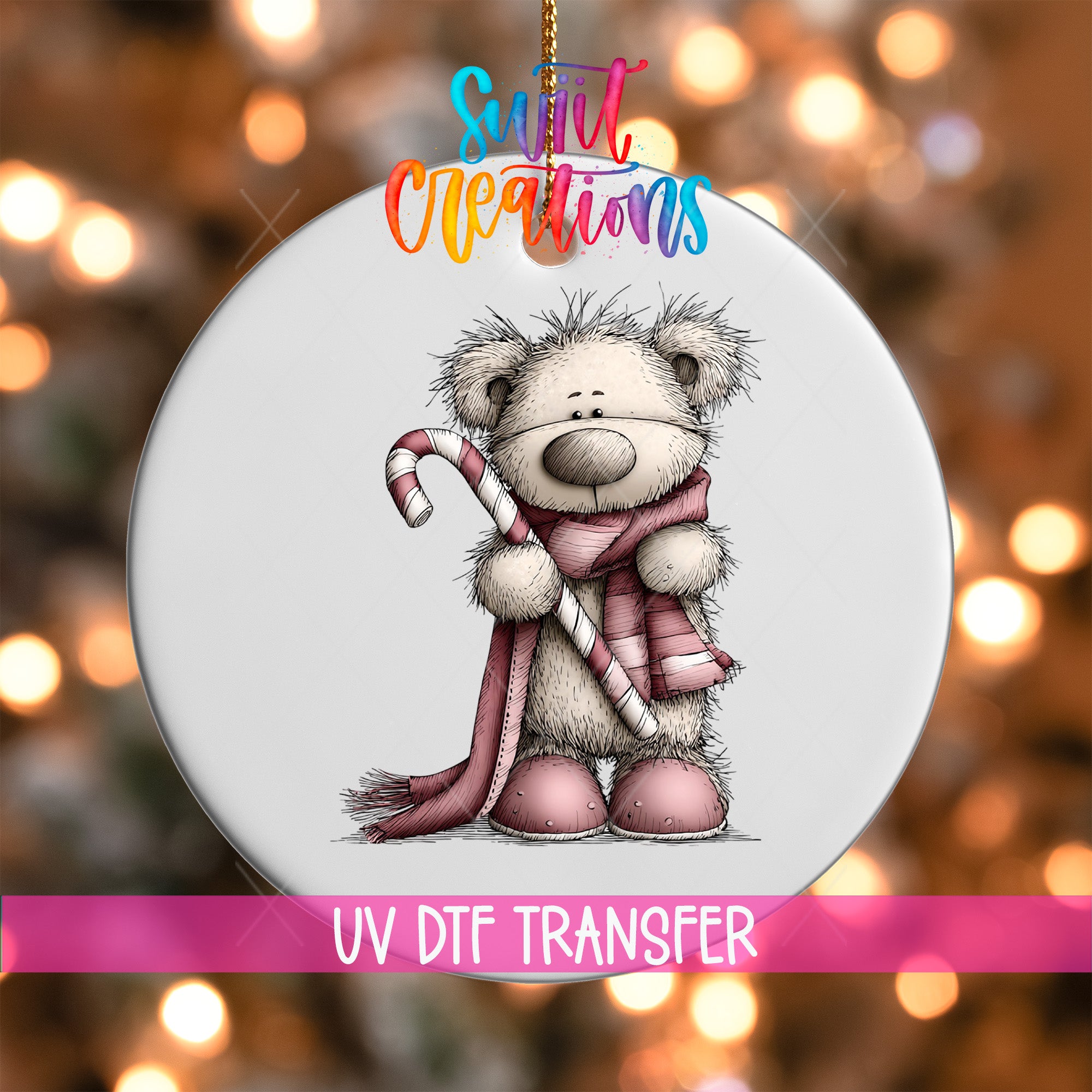 A white ornament with a teddy bear holding a candy cane, set against a background of colorful lights.