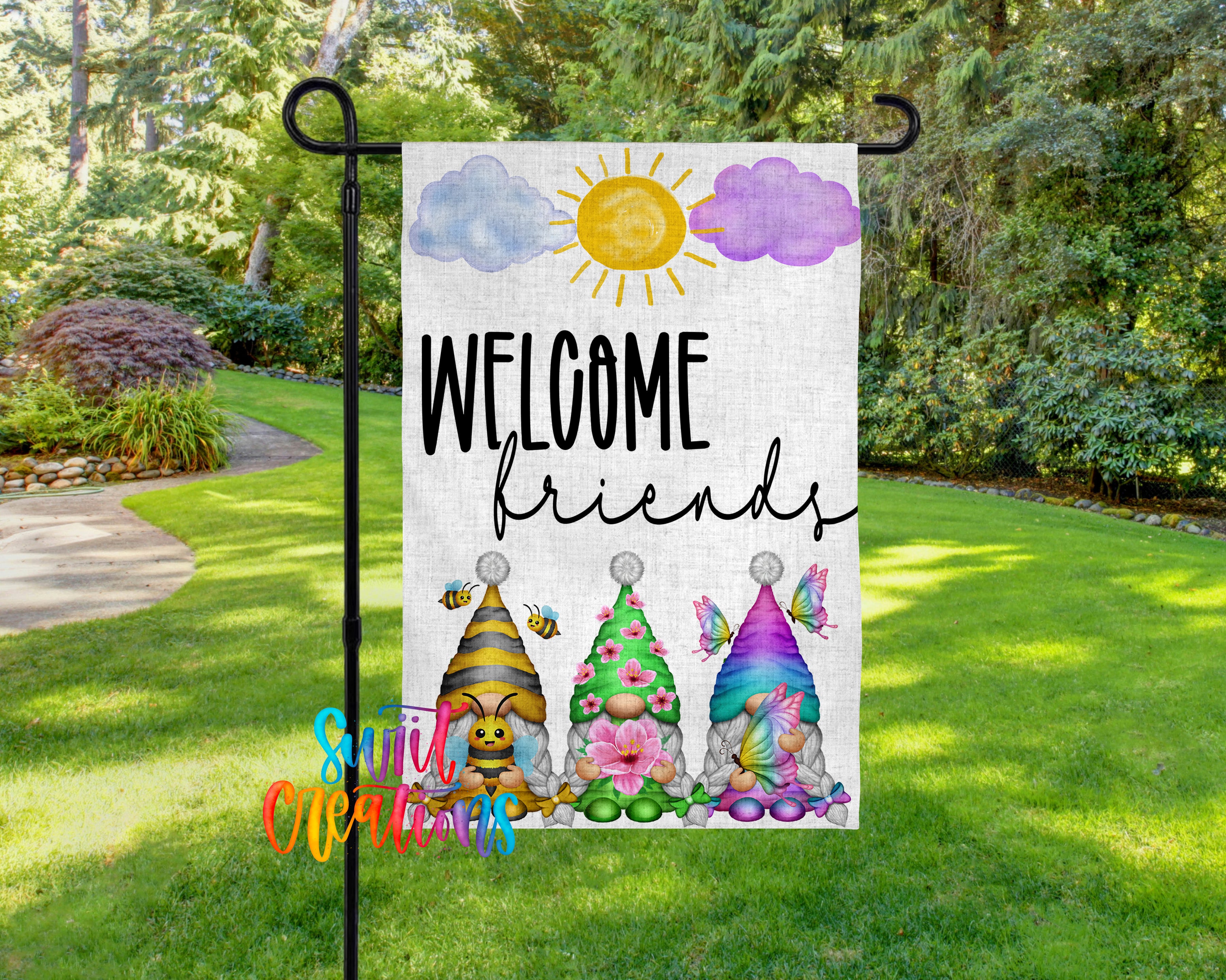 A garden sign with a welcoming message and illustrations of three colorful gnomes.