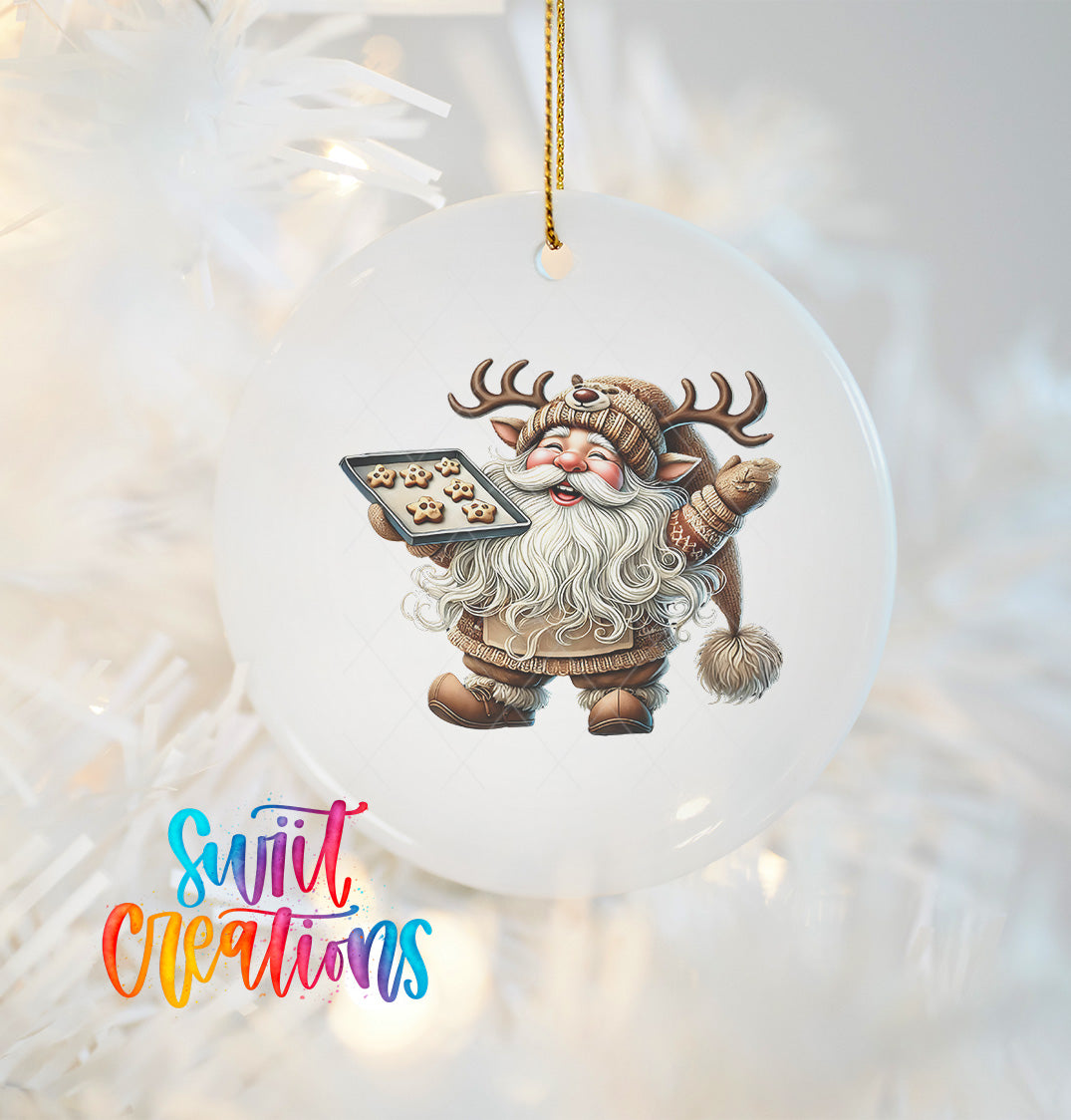 A white ornament featuring a cartoon image of Santa Claus holding a tray of cookies.