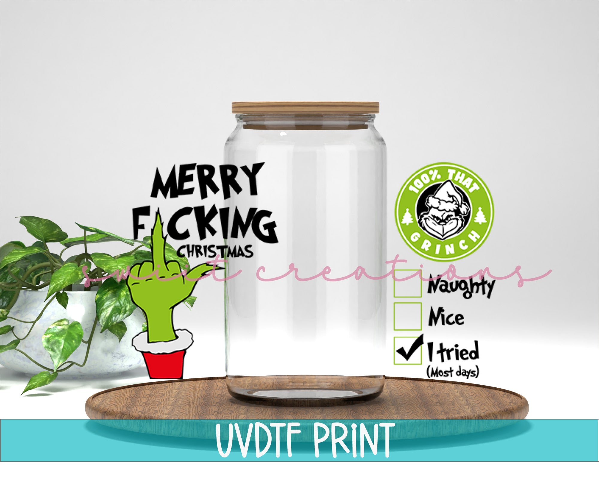 a glass jar with a sticker on it next to a potted plant