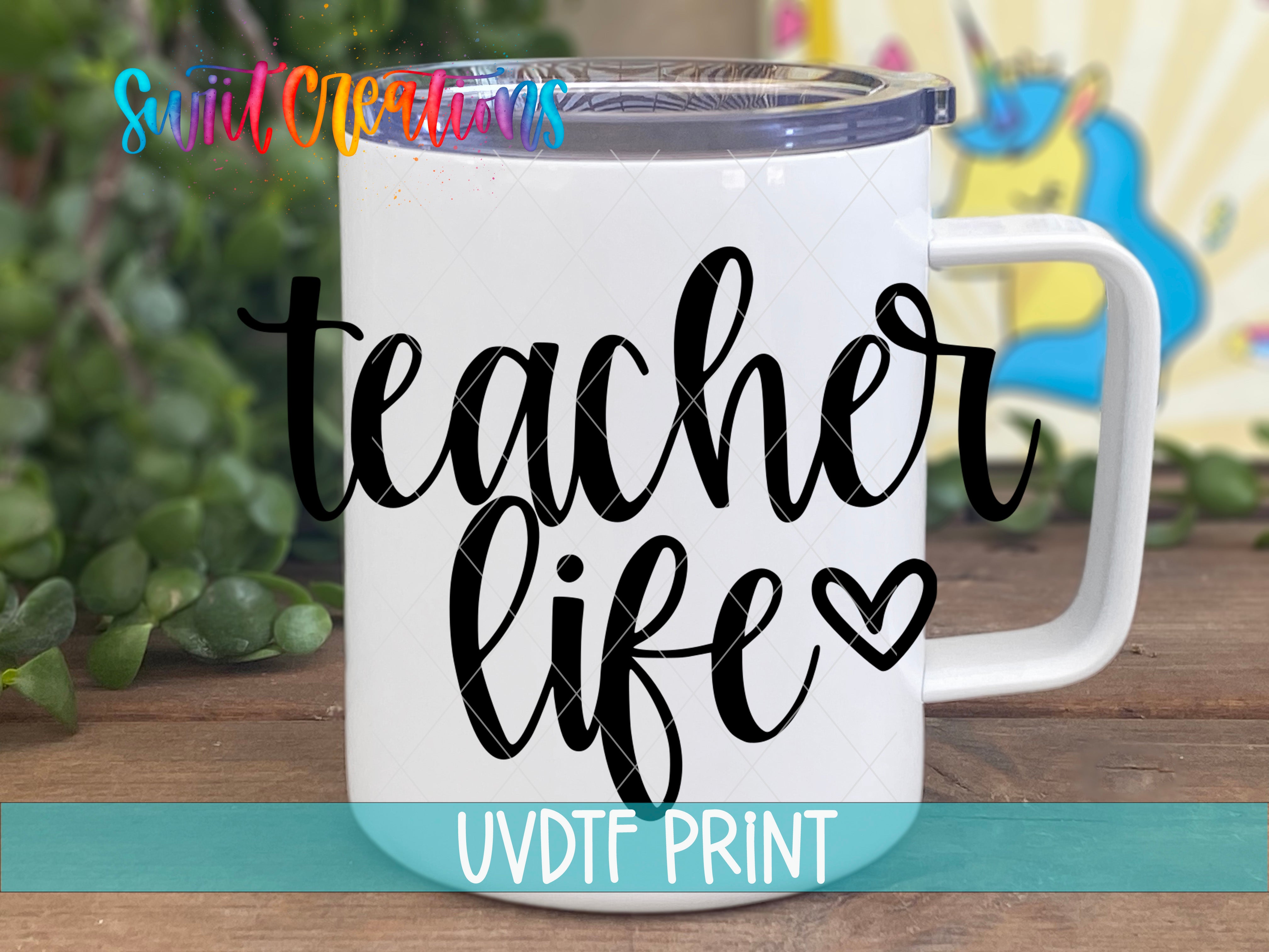 a white coffee mug with the words teacher life on it