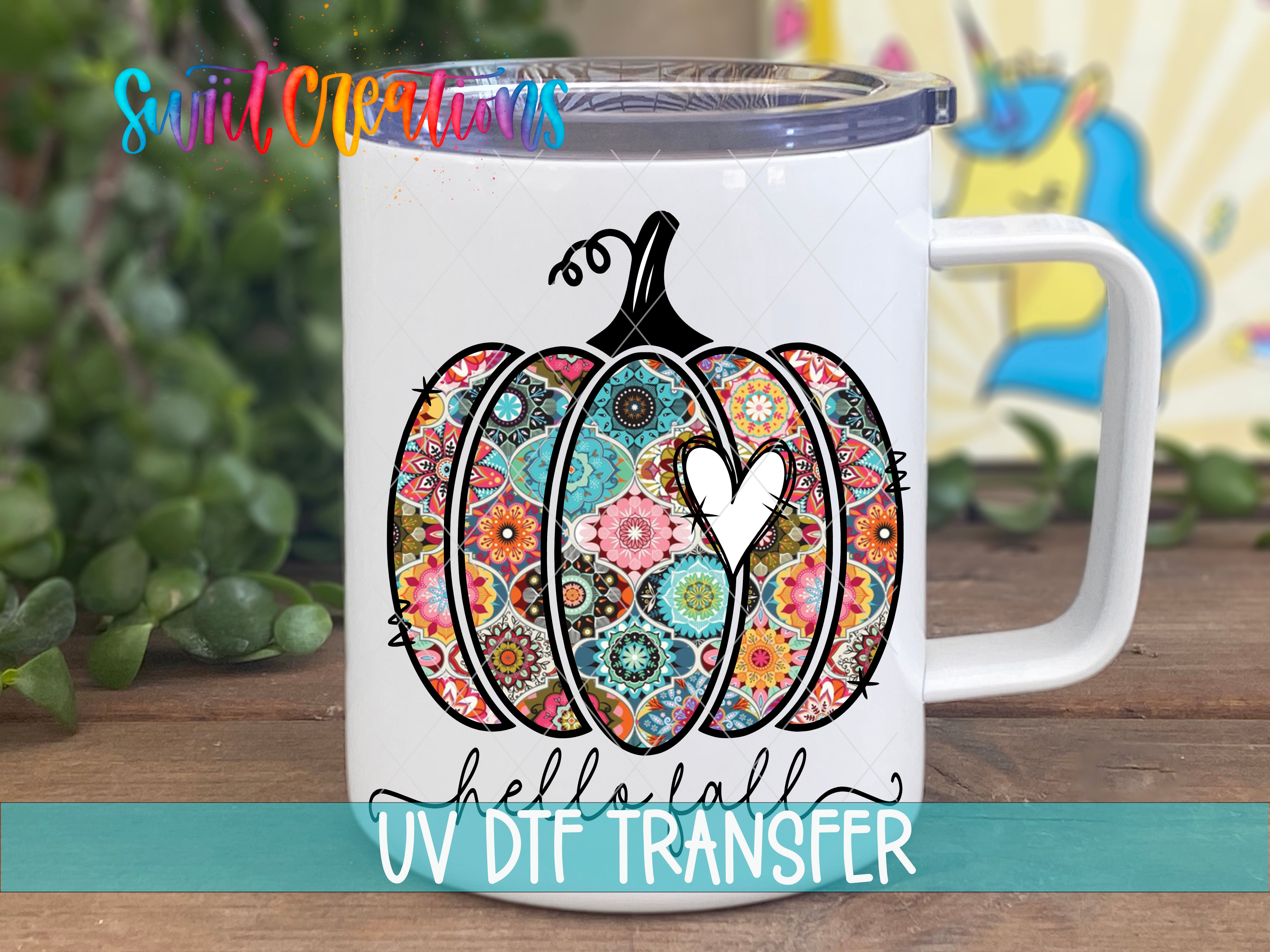 Swiit Creations UV DTF Hello Fall Pumpkin transfer displayed on a white coffee mug