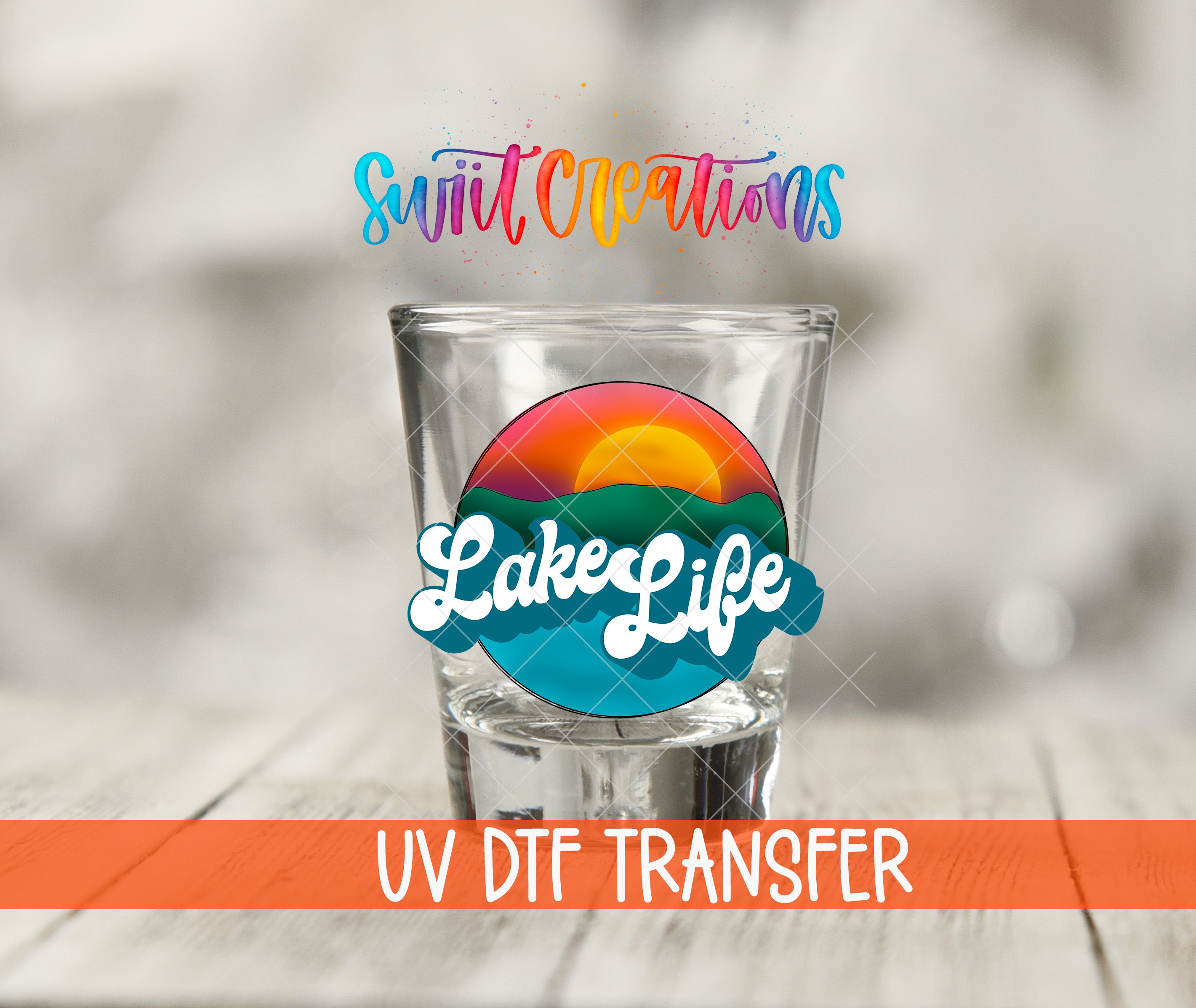 A shot glass with a colorful design and the text "LakeLife" on it, along with the text "UV Dtf Transfer" below it.