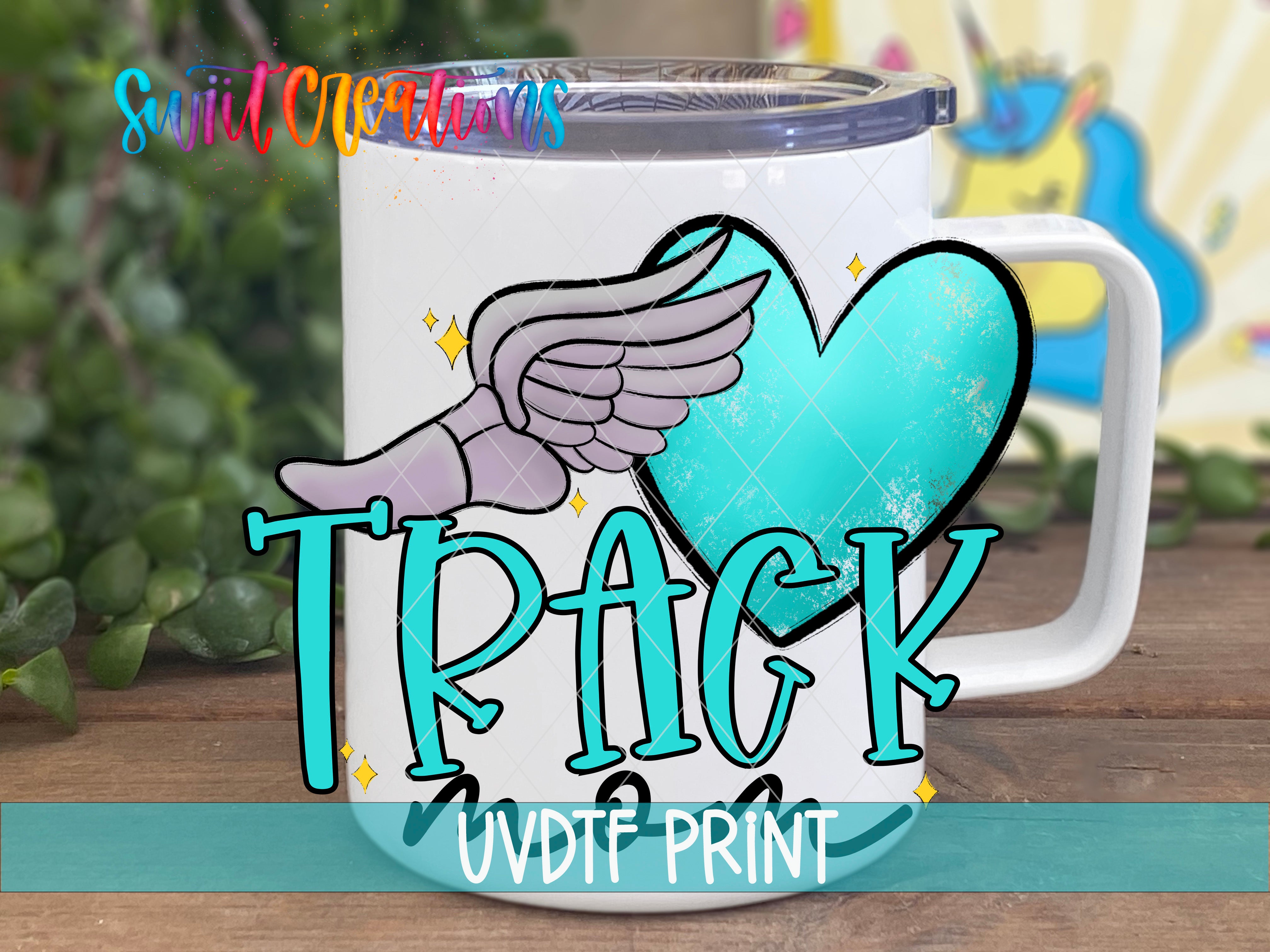 a white coffee mug with a blue heart and angel wings