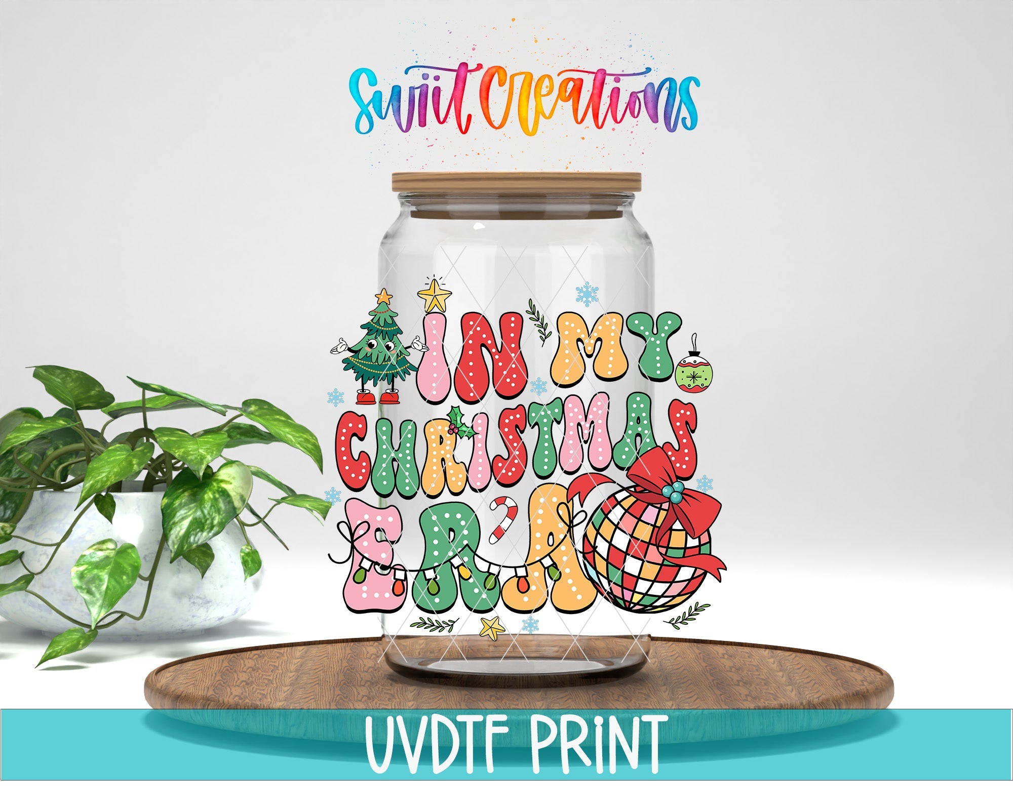a glass jar filled with christmas decorations on top of a wooden table