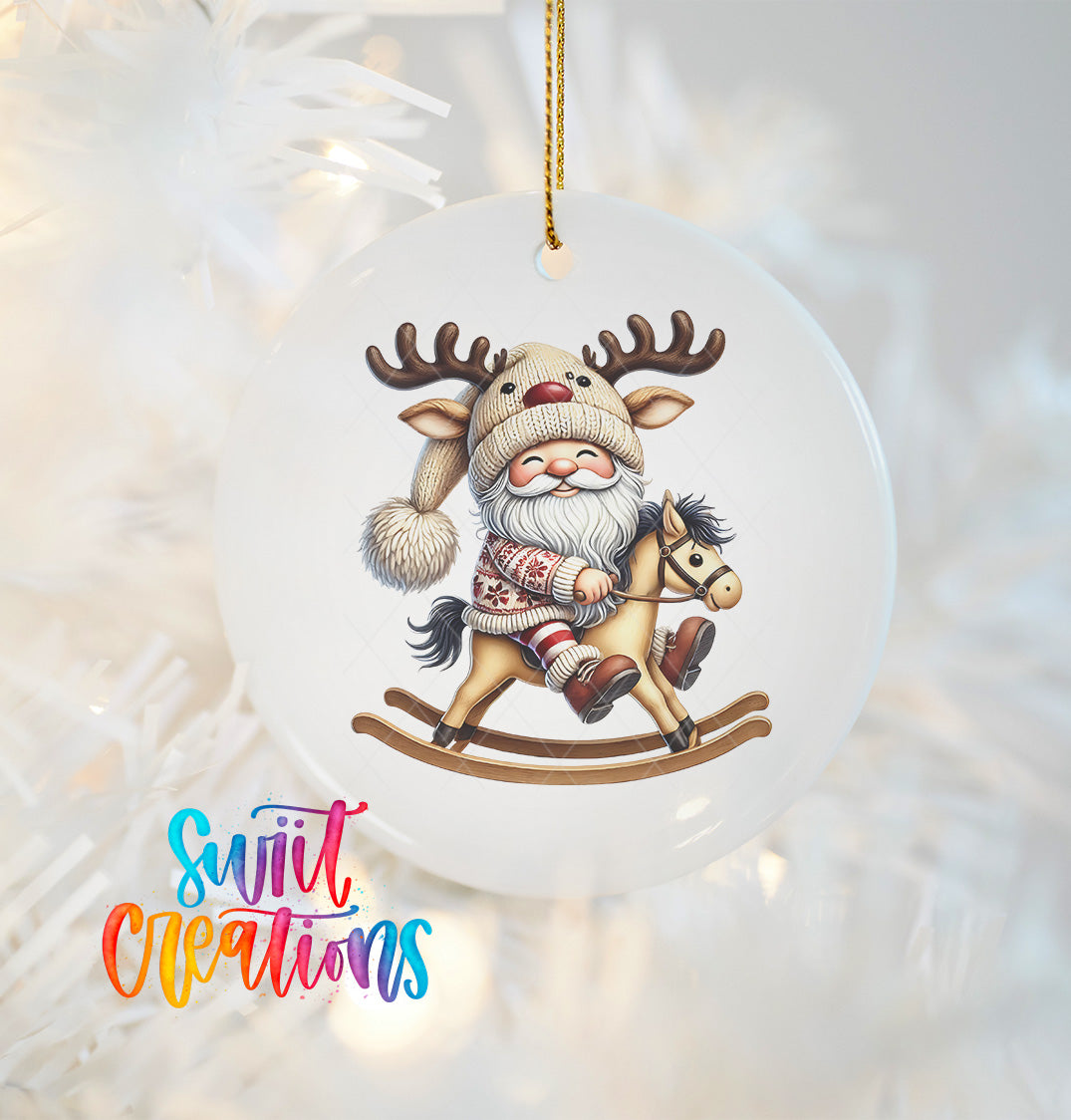 A white ornament with a cartoon image of Santa Claus riding a rocking horse.