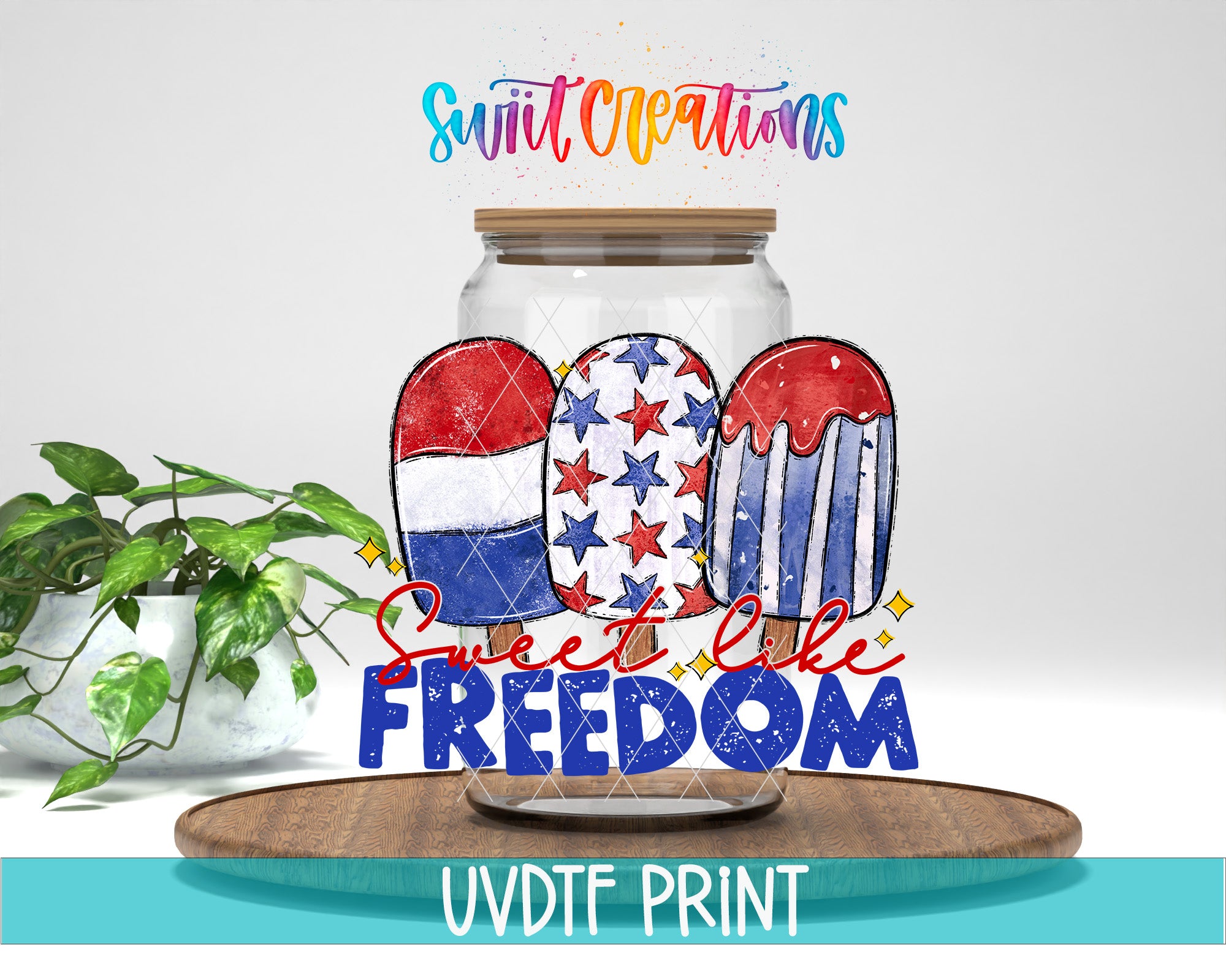a glass jar with a patriotic design, including a red, white, and blue popsicle-like shape, and the text "Sweet like freedom" written on it. The jar is placed on a wooden surface, and there is a plant in the background.