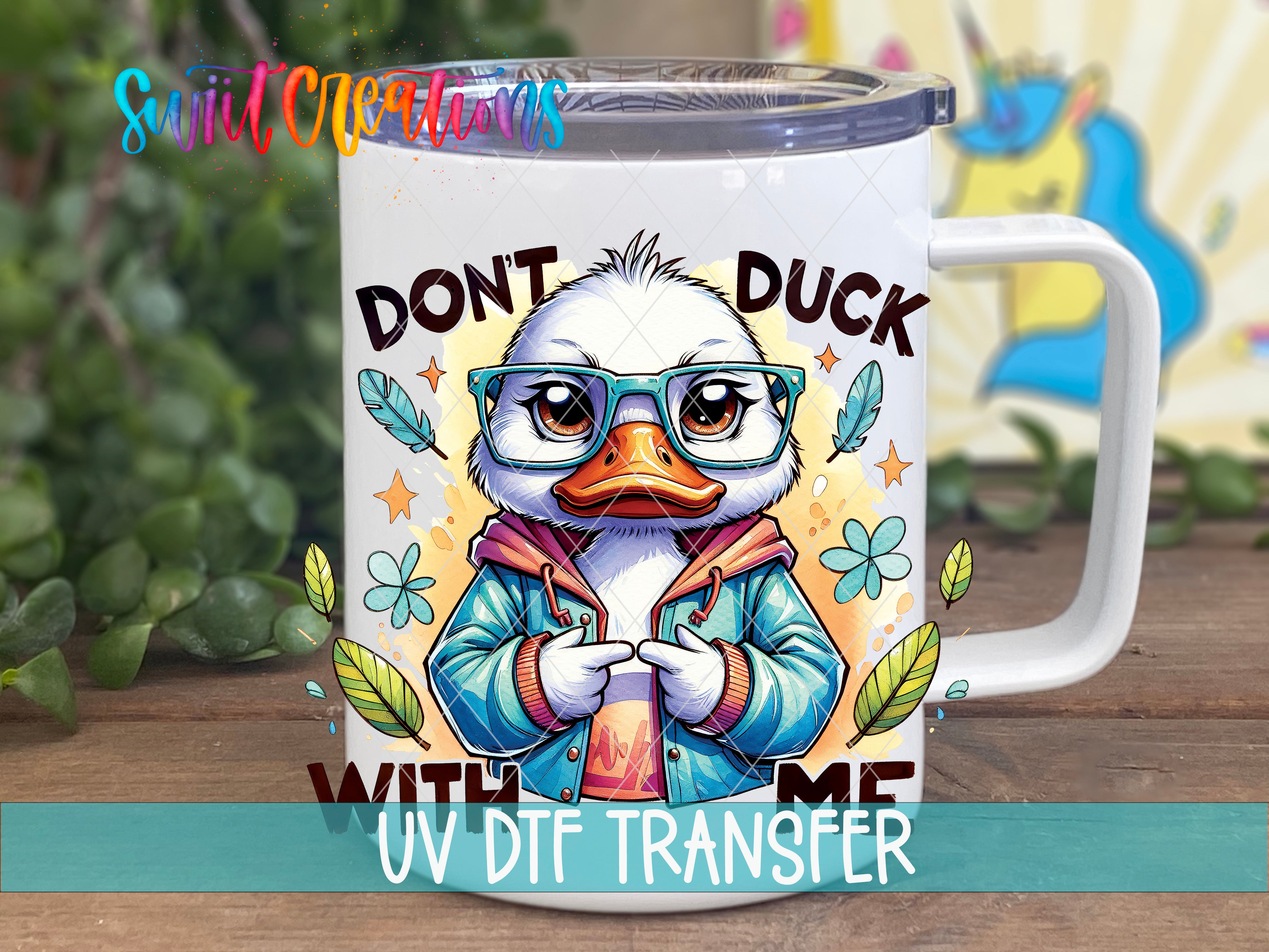Swiit Creations UV DTF Don’t Duck With Me transfer displayed on a white coffee mug