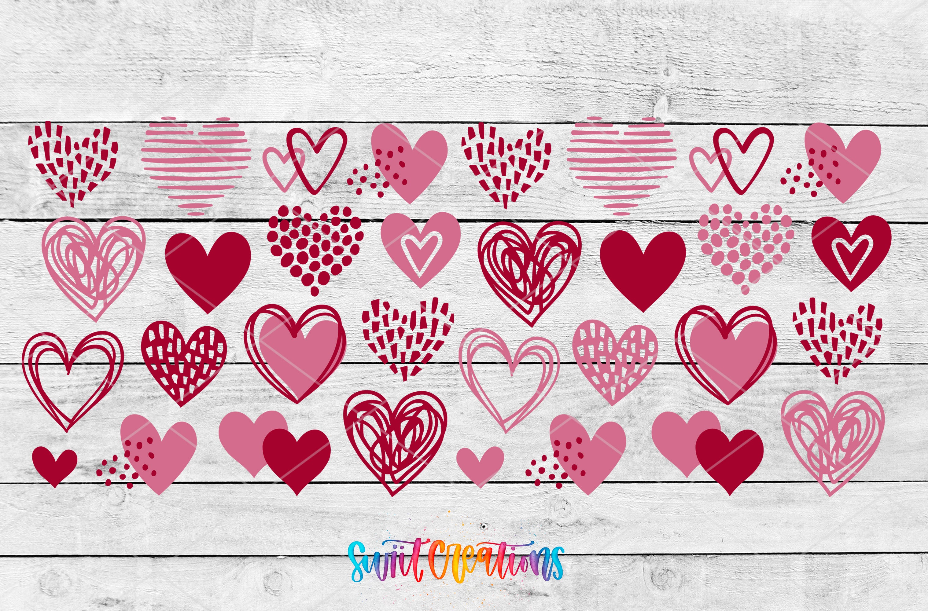 a variety of heart-shaped designs in shades of pink and red, arranged in a grid-like pattern on a white wooden background.