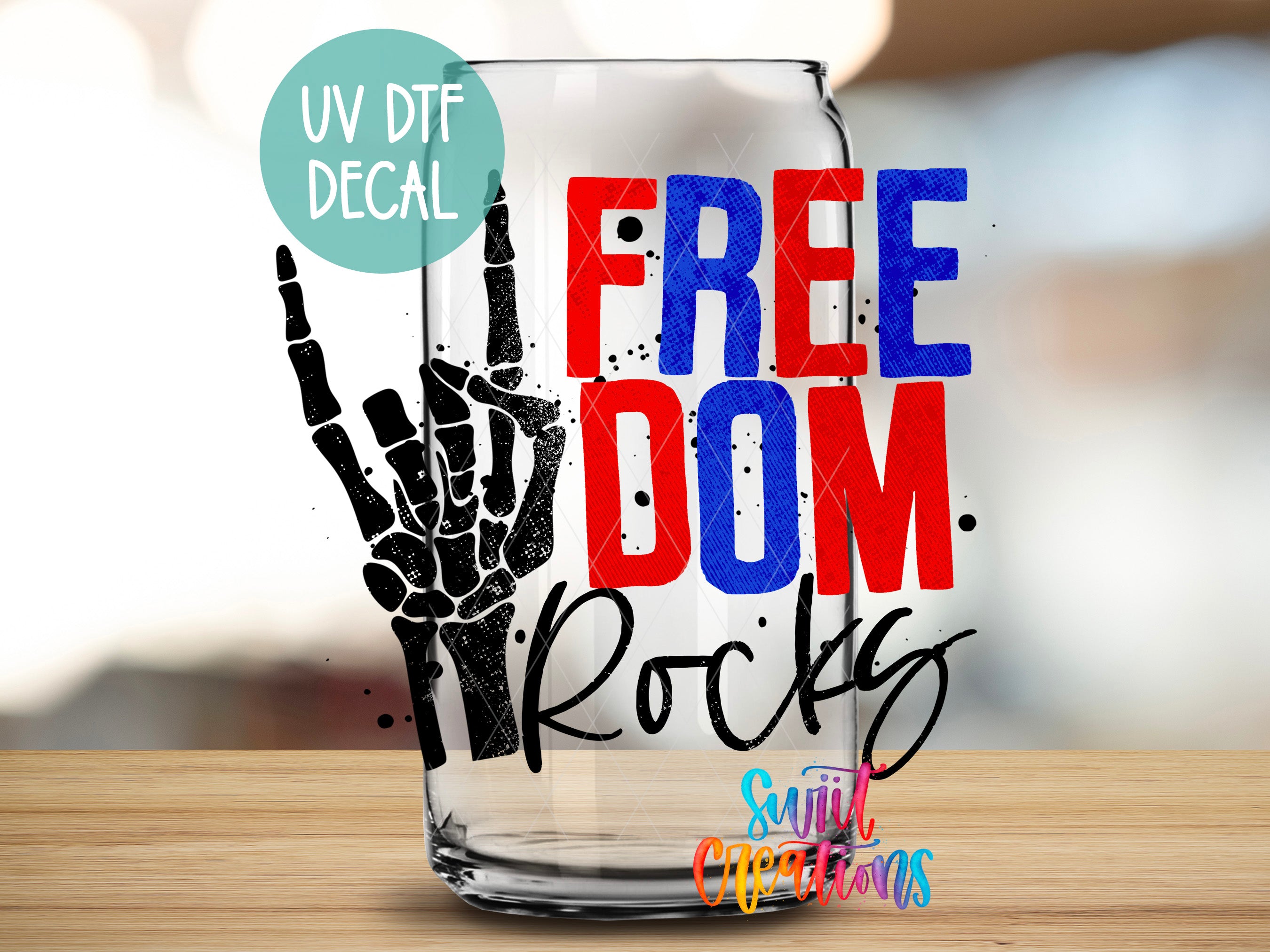 a beer glass with a freedom rock hand painted on it