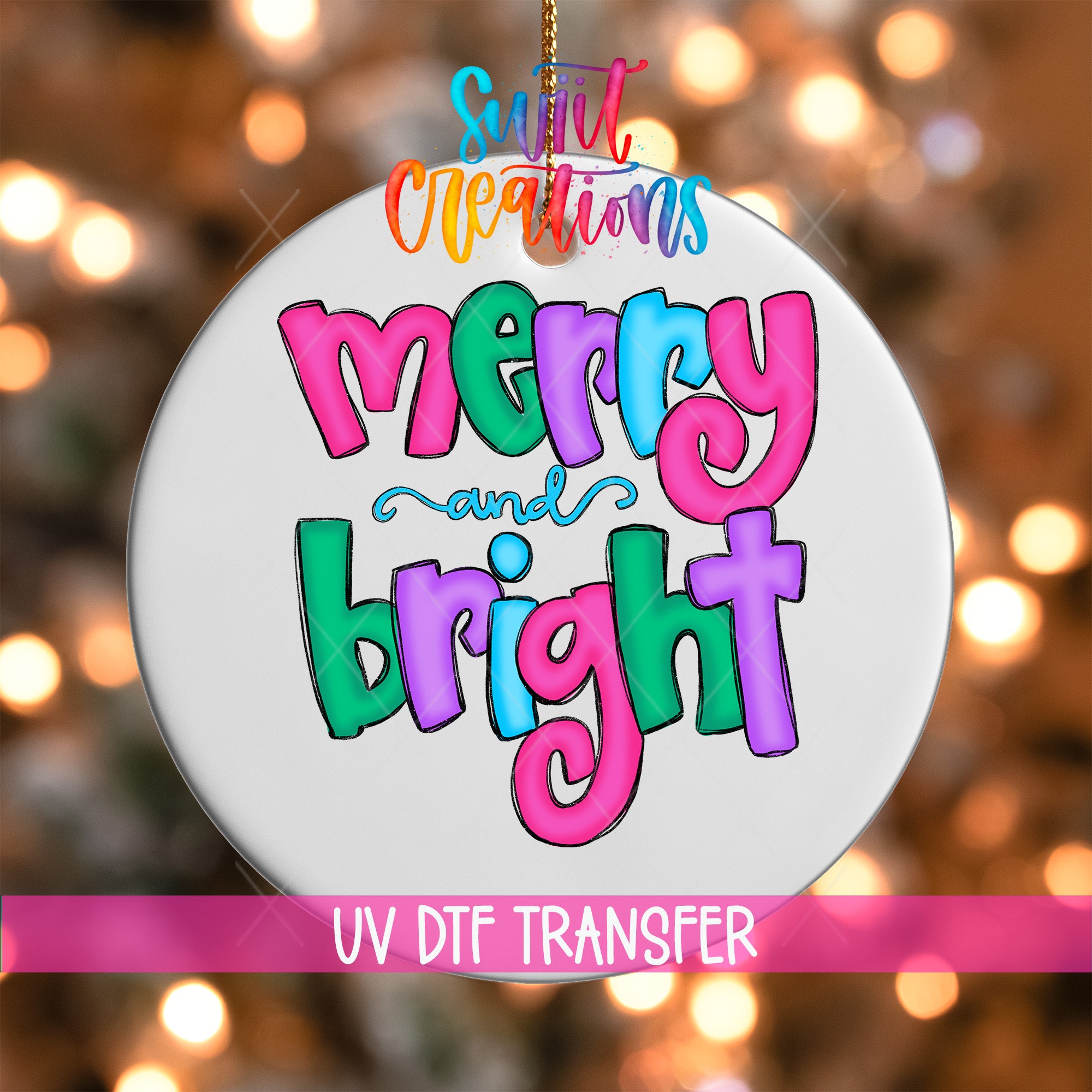 A colorful ornament with the text "merry and bright" in a stylized font, hanging against a background of blurred lights.