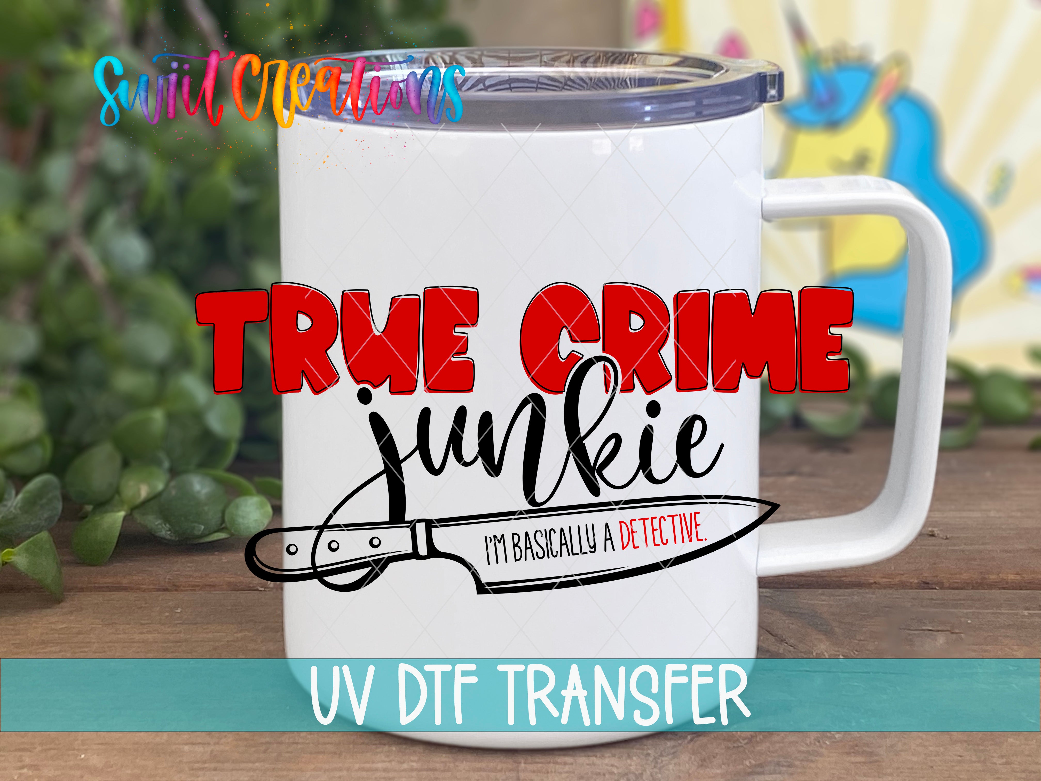 Swiit Creations UV DTF True Crime Junkie transfer displayed on a white coffee mug