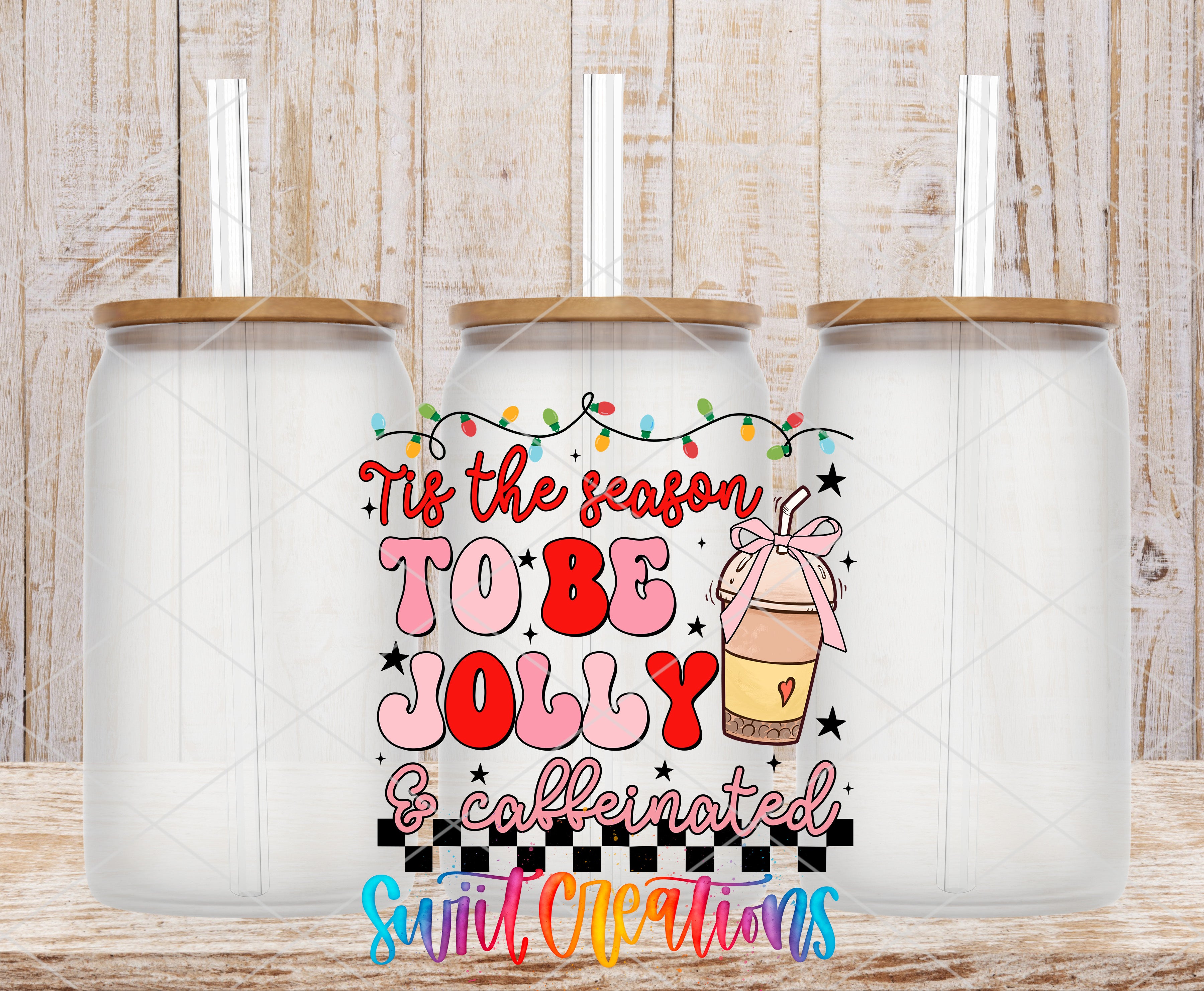 Swiit Creations UV DTF Jolly and Caffeinated Christmas transfer shown on a clear glass can set