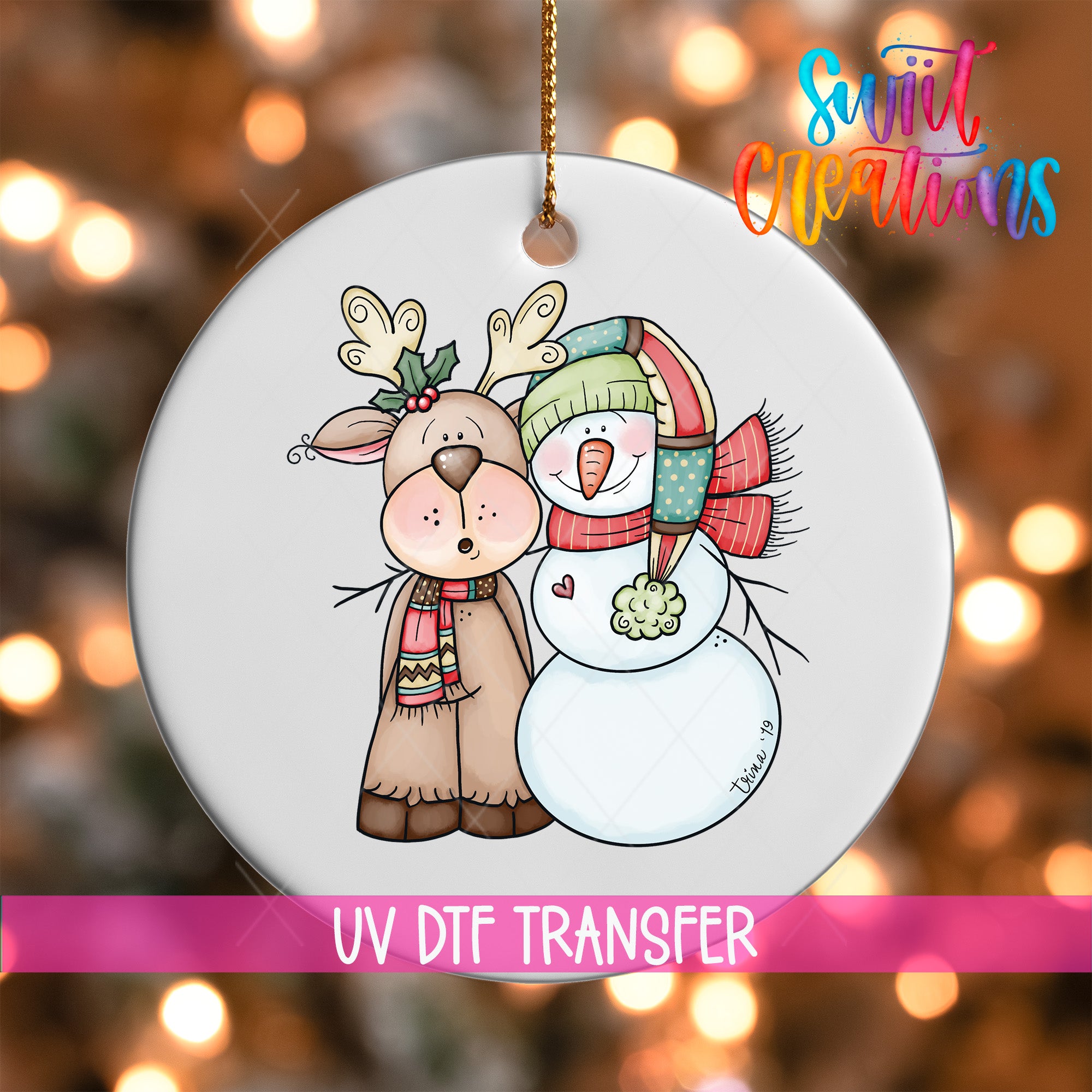 A white ornament featuring a cartoon illustration of a reindeer and a snowman, with the text "UV Dtf Transfer" and "Sweet Creations" written below the image.